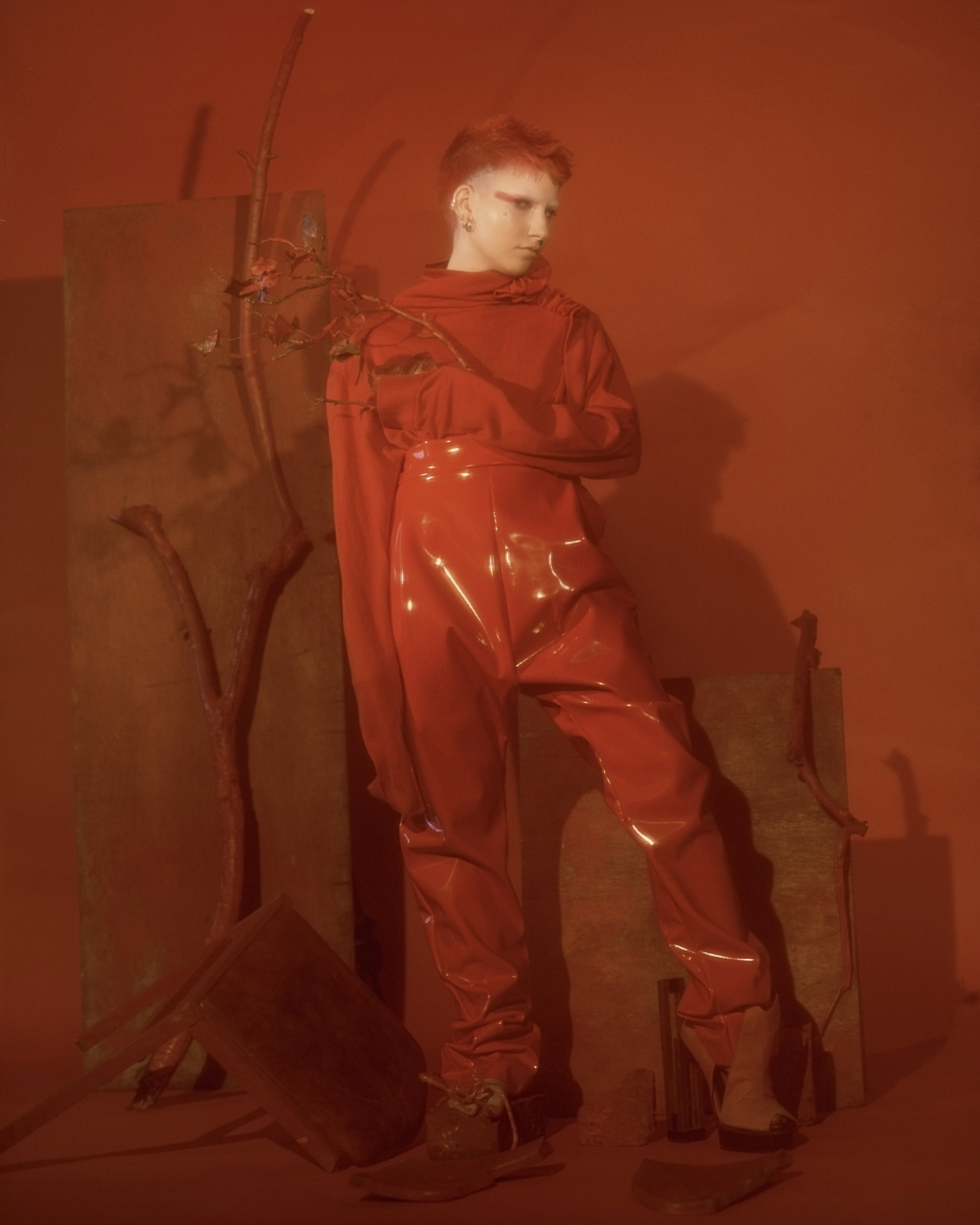 Liz wears top and trousers LES ANIMAUX , shoes CAROLIN HOLZHUBER