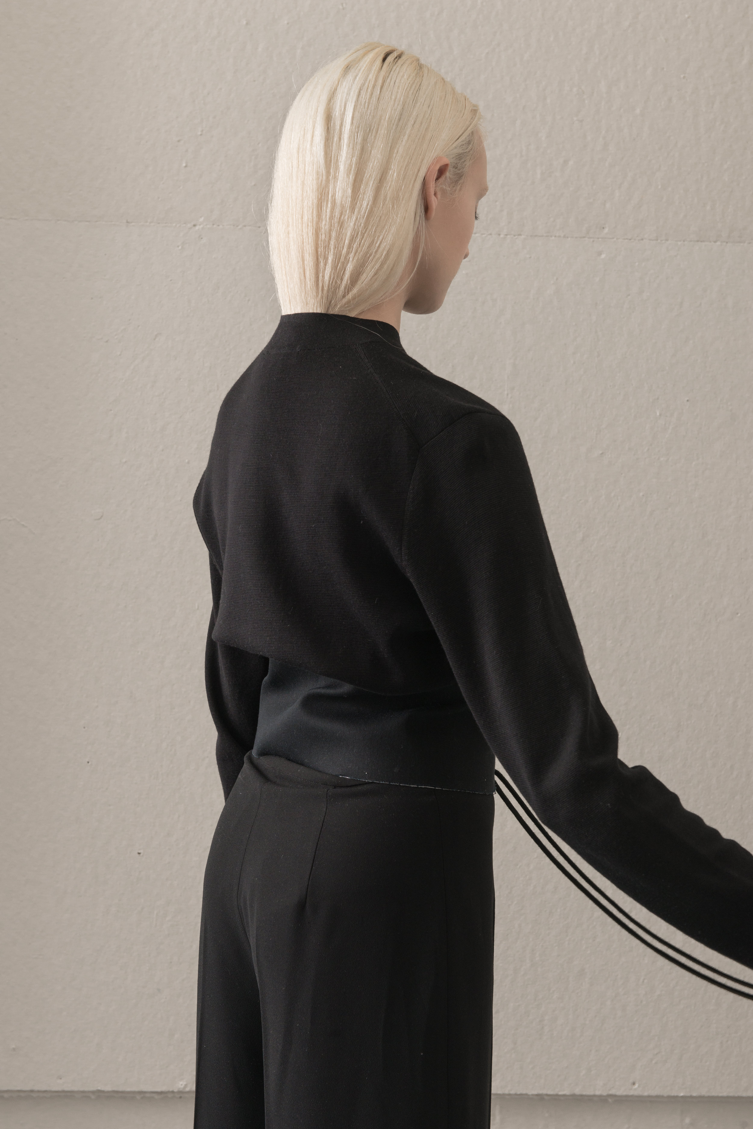 turtleneck COS, corset AI, pants THEORY, stocking WEST LOOP
