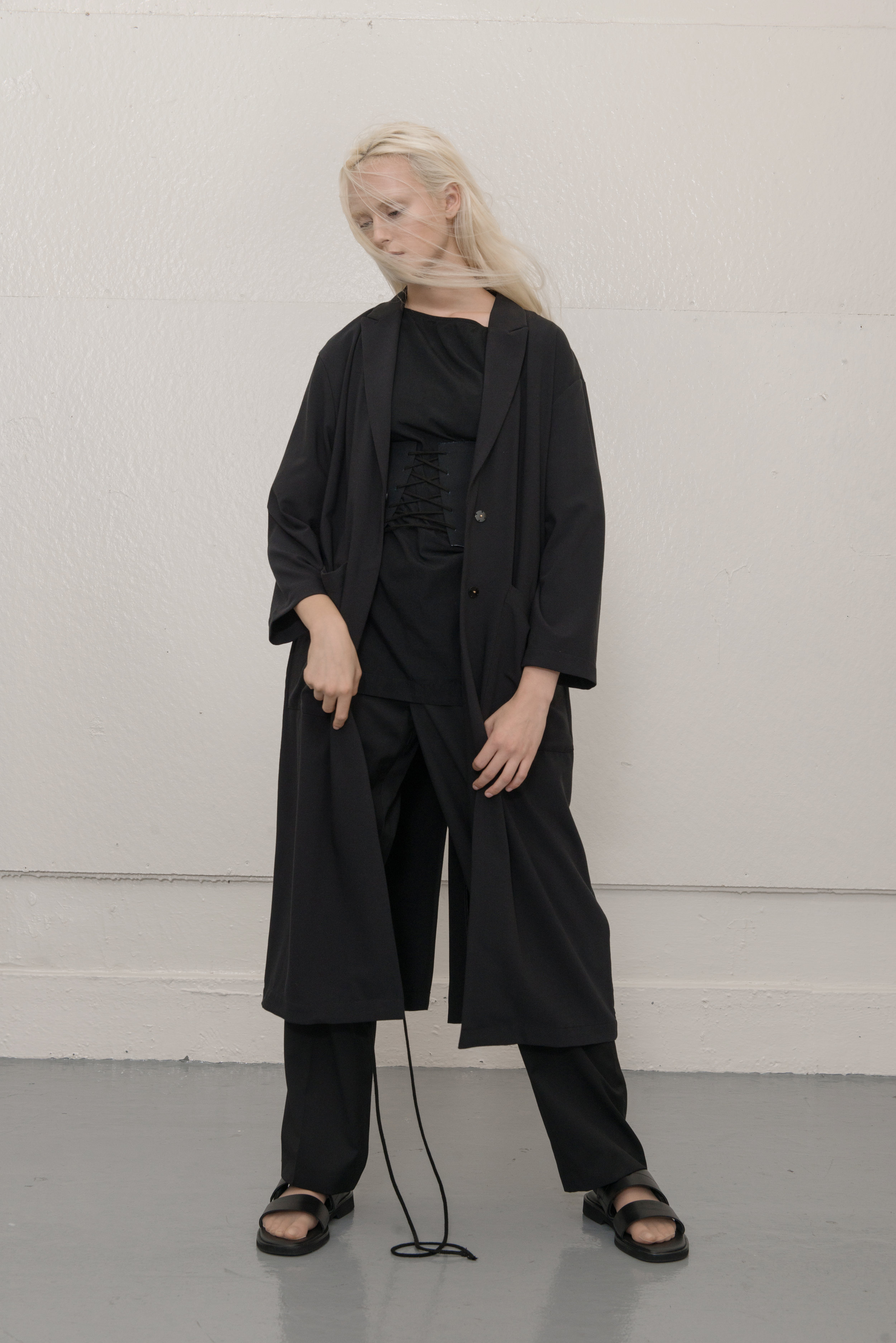 coat STYLIST'S OWN, top COS, pants THEORY, shoes COS