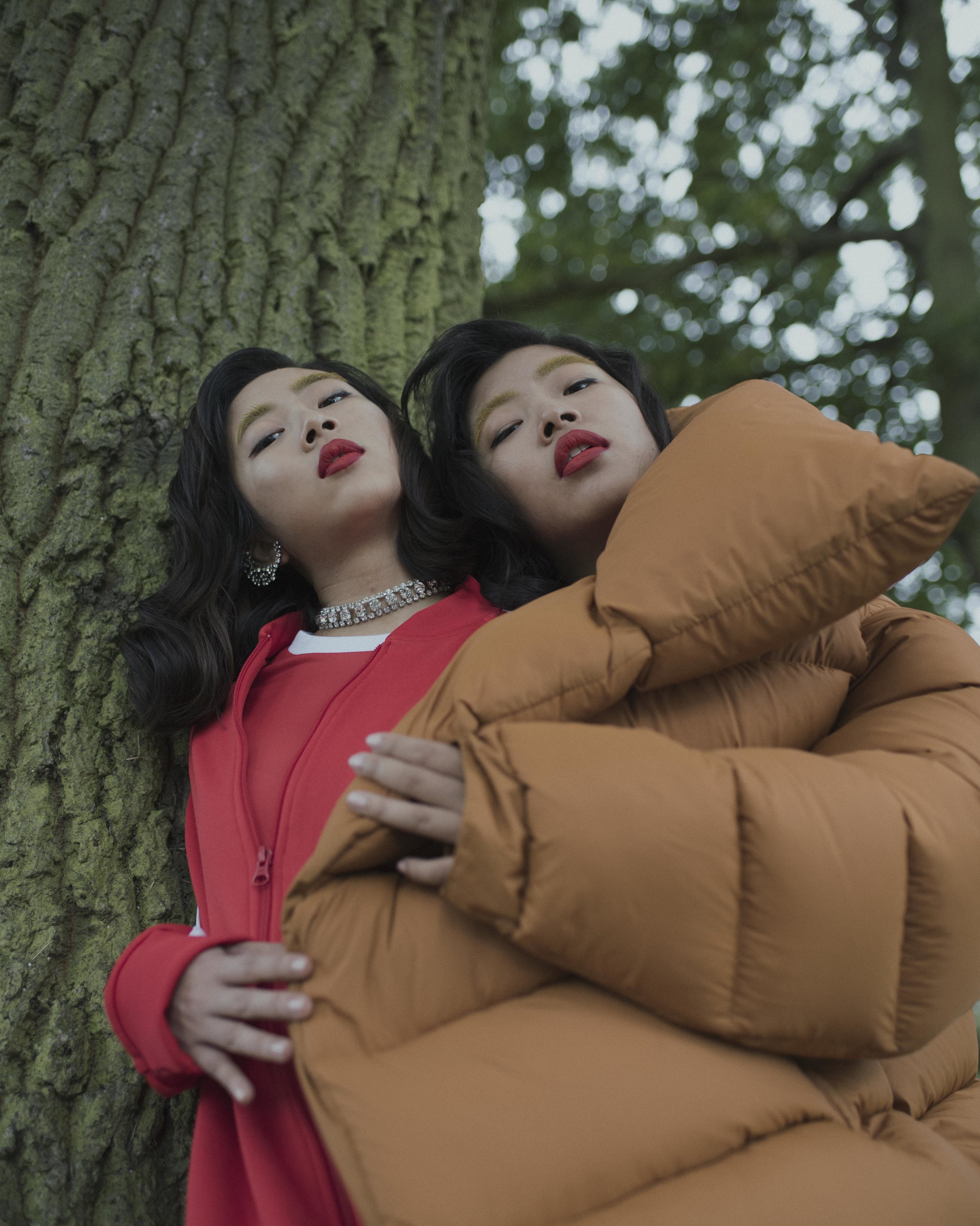 Yan wears full tracksuit ADIDAS , shoes PUBLIC DESIRE , choker KRYSTAL, earring SWAROVSKI Joey wears shoes CAMILLA MECACCI , coat MARQUES ALMEIDA , bodysuit VICTOR PATRICIO JIMENEZ TORRES
