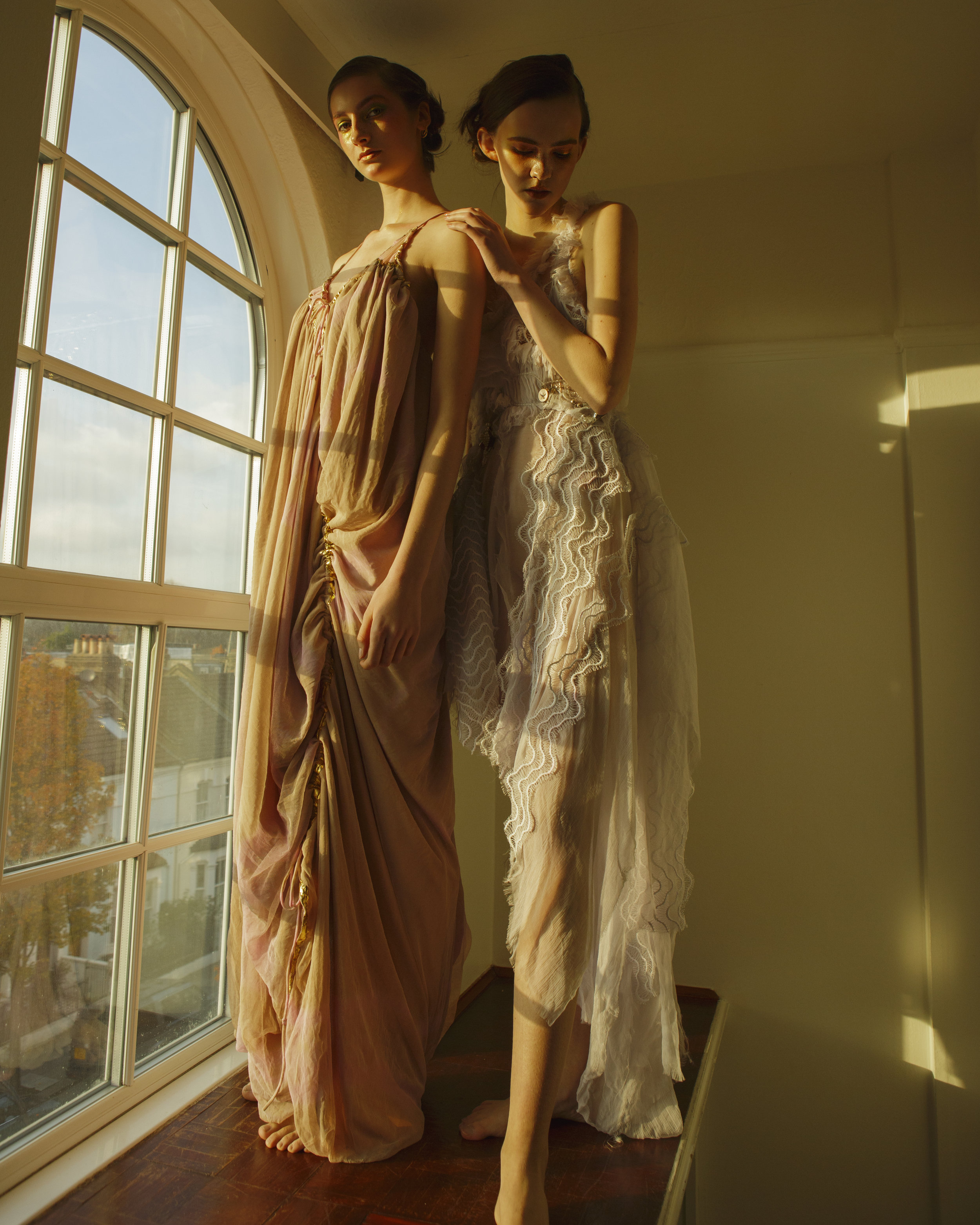 left dress ELENA KOUTSIA, right dress DMITRY GOTSFRID
