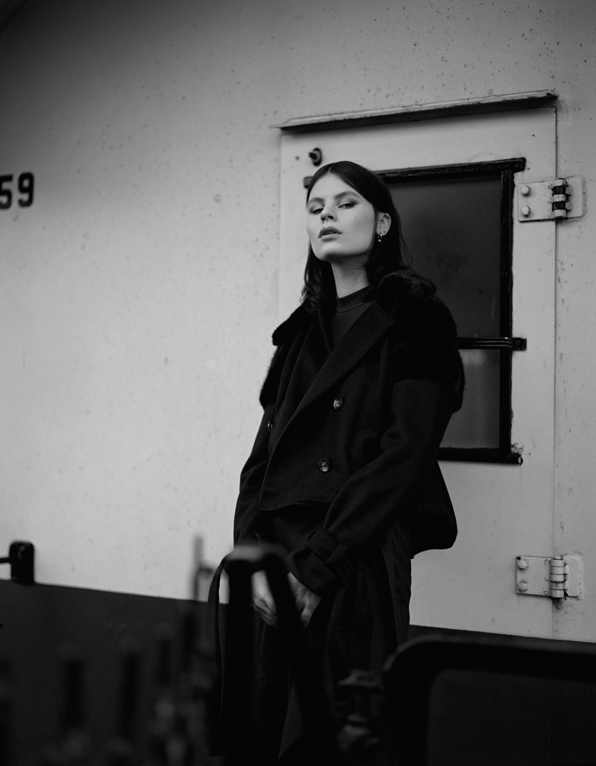 coat FOR LOVE AND LEMONS , top TOPSHOP, skirt + pants FILIPPA K , earrings STYLIST’S OWN