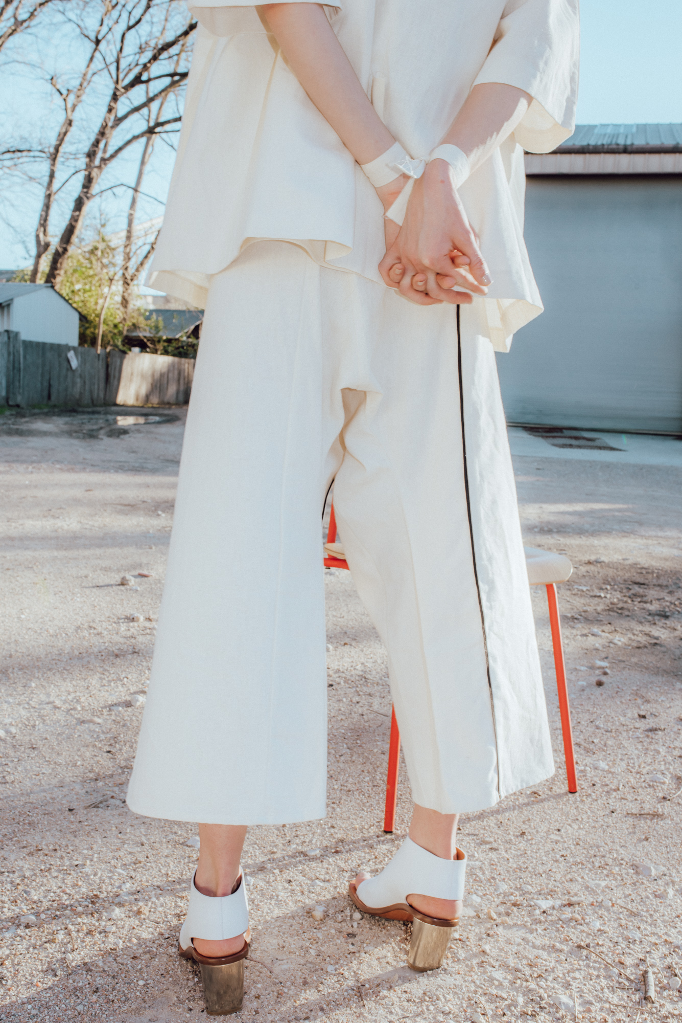 jacket + pants + wrist ties BEING APPAREL , shoes CELINE