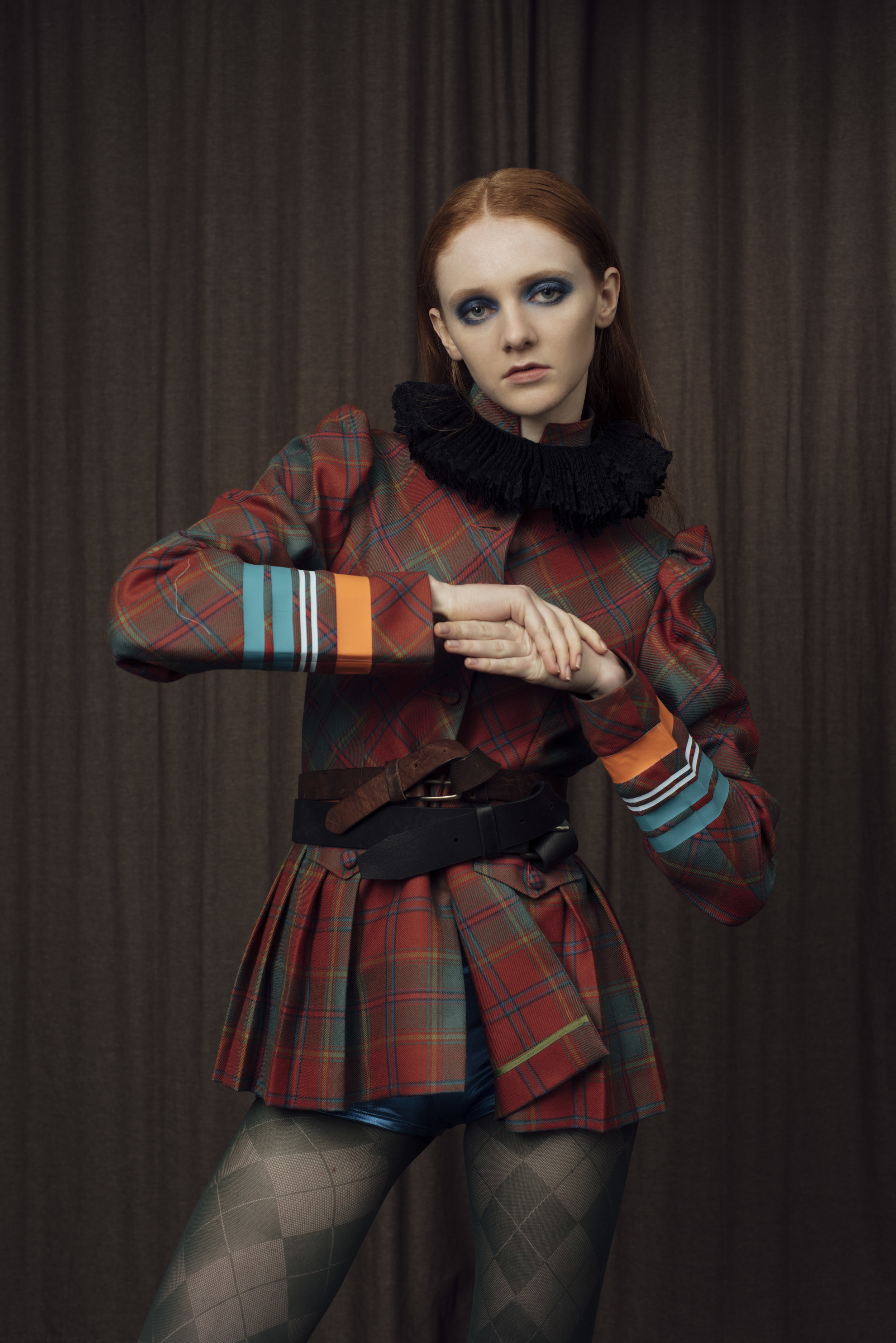 collar COSTUME STUDIO, jacket BAREIA AHMAD , shorts STYLIST’S OWN .