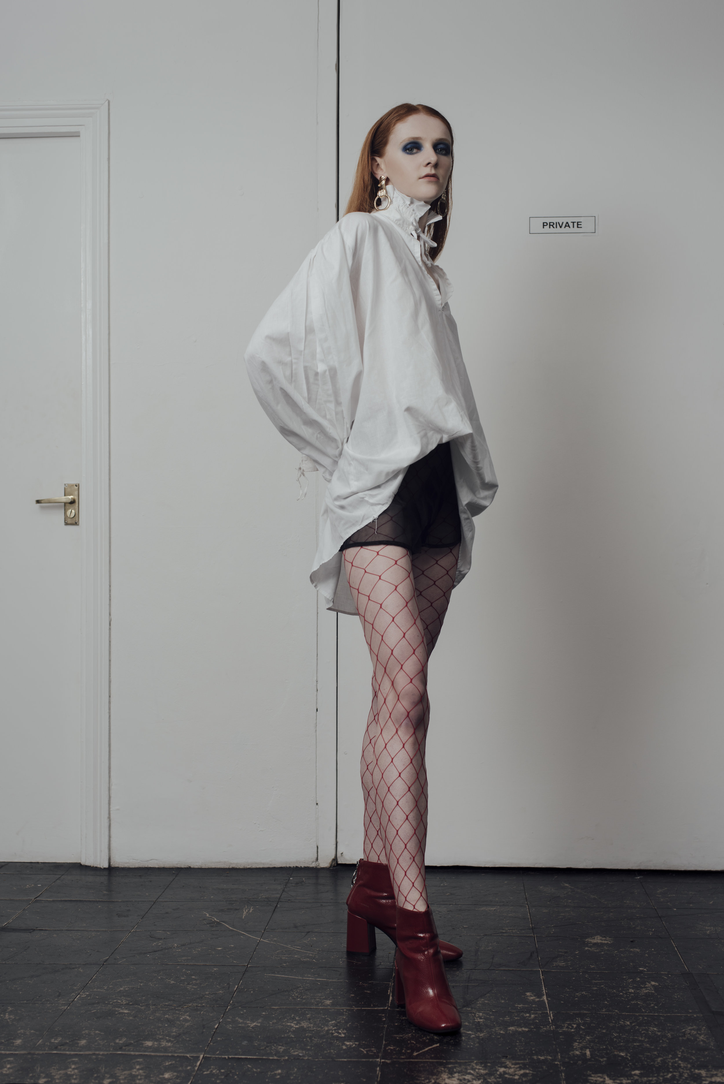 shirt COSTUME STUDIO,, shorts STYLIST’S OWN, boots STYLIST’S OWN