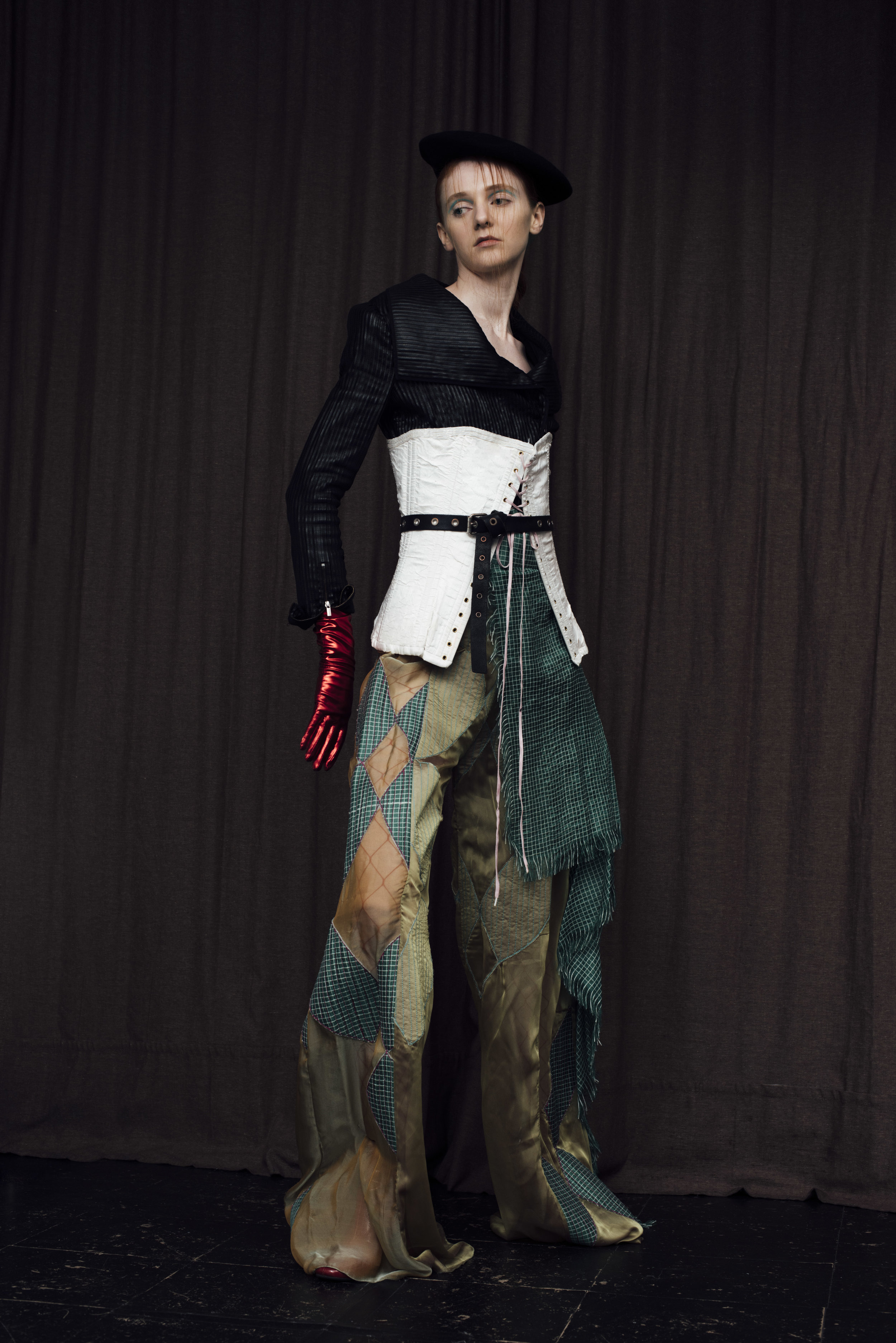 Jacket BCBG , corset COSTUME STUDIO, trousers CONSTANCE BLACKBALLER , glove STYLIST’S OWN, beret BEYOND RETRO