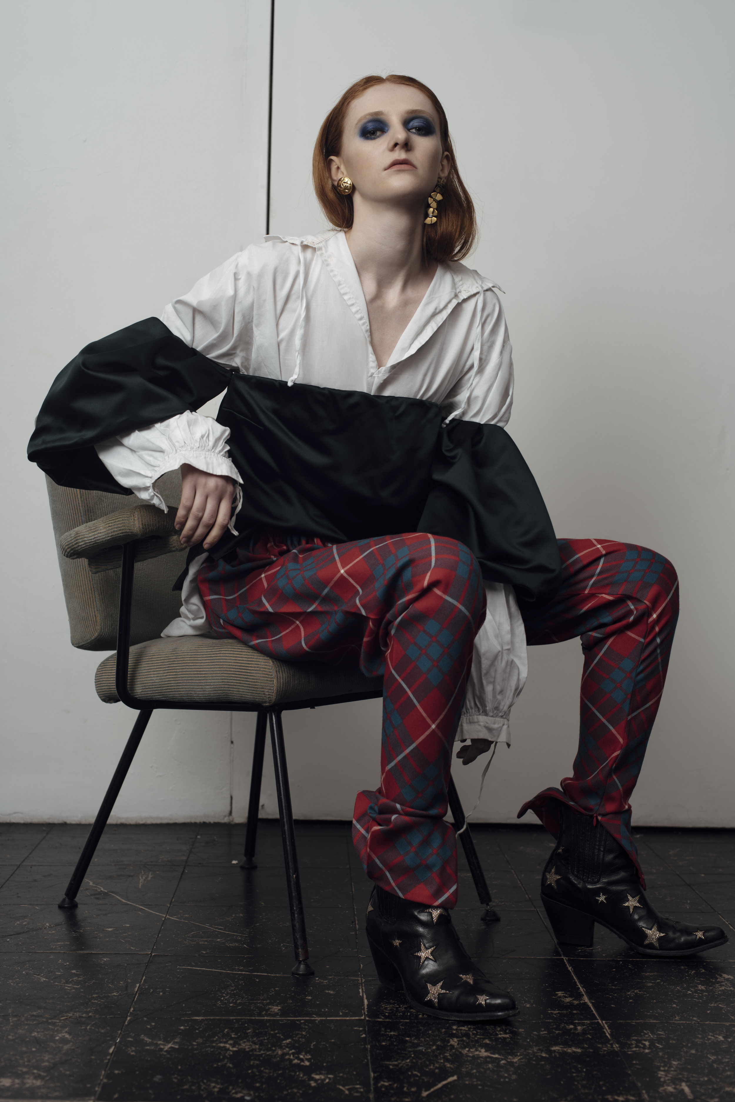 shirt COSTUME STUDIO, trousers BAREIA AHMAD , Star cowboy moots MEXICANA Earrings STYLIST’S OWN