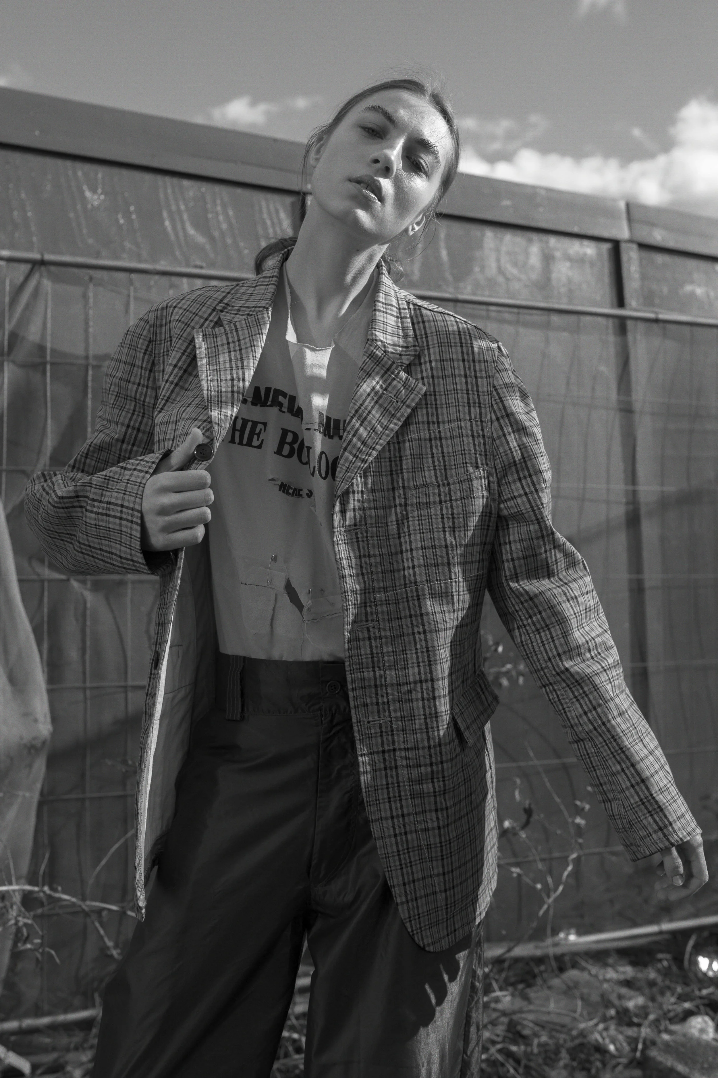 blazer COMME DES GARÇONS, vest STYLIST’S OWN, trousers JANIS KUTILS, boots MAISON MARGIELA
