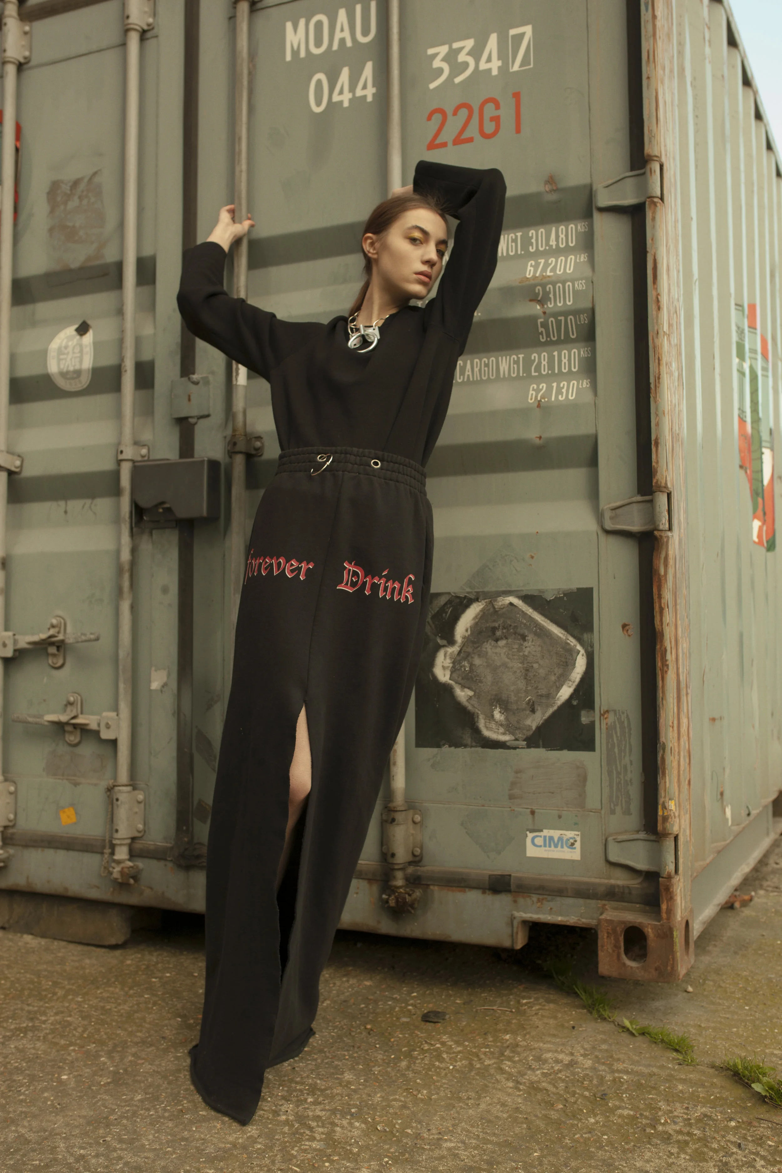 choker STYLIST’S OWN, sweater ACNE STUDIOS, skirt VETEMENTS, boots MAISON MARGIELA