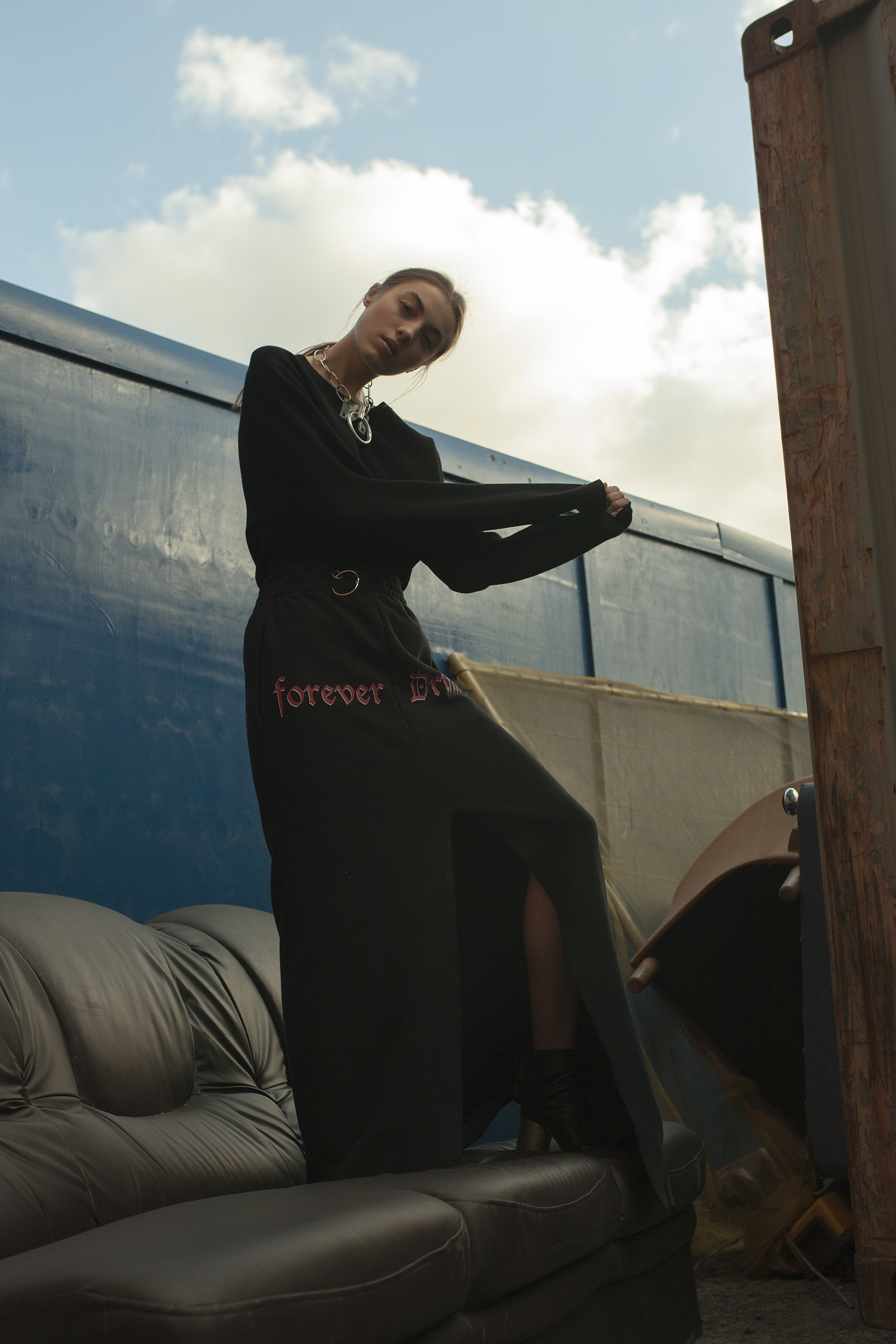 choker STYLIST’S OWN, sweater ACNE STUDIOS, skirt VETEMENTS, boots MAISON MARGIELA