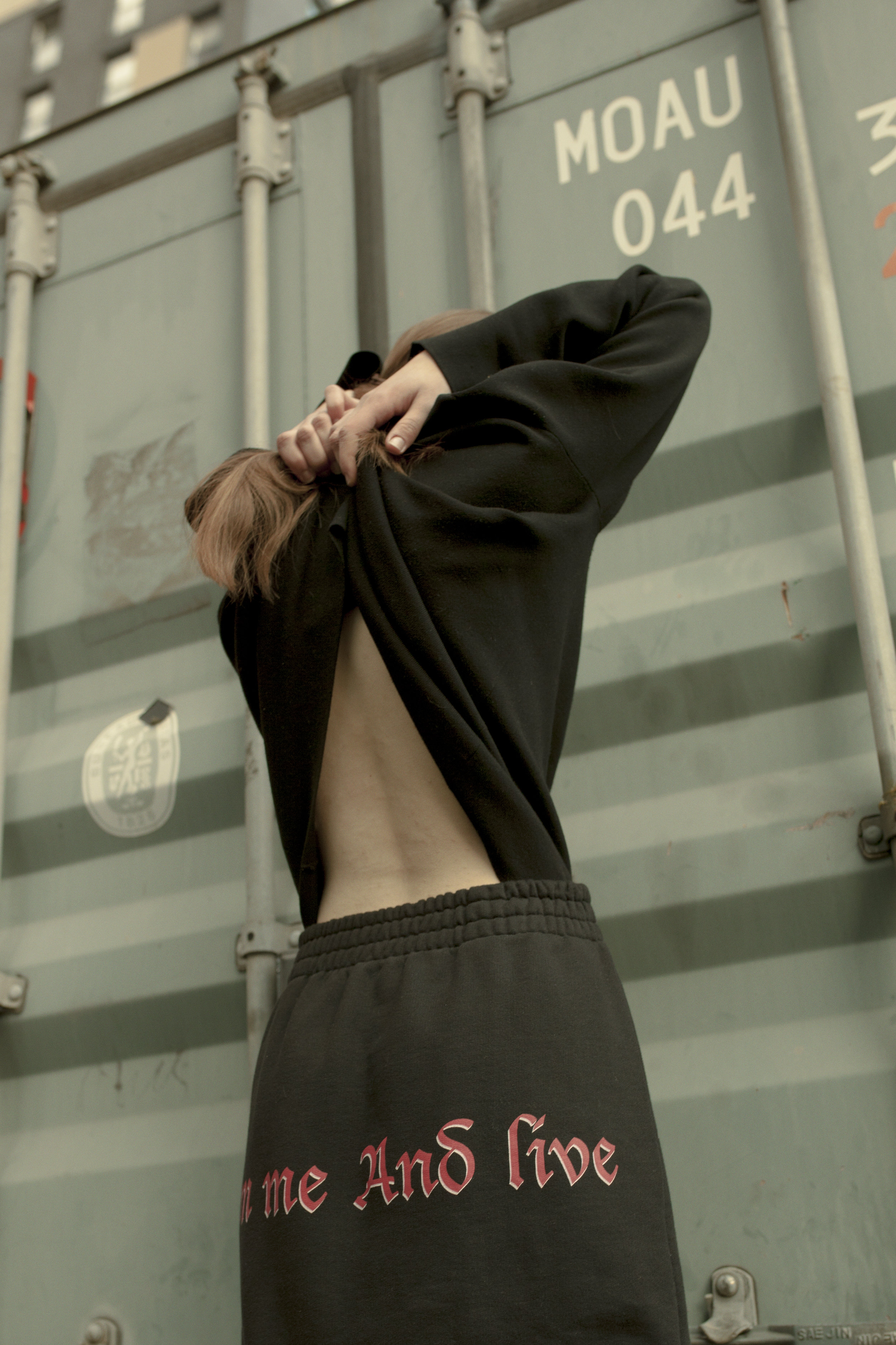 choker STYLIST’S OWN, sweater ACNE STUDIOS, skirt VETEMENTS, boots MAISON MARGIELA