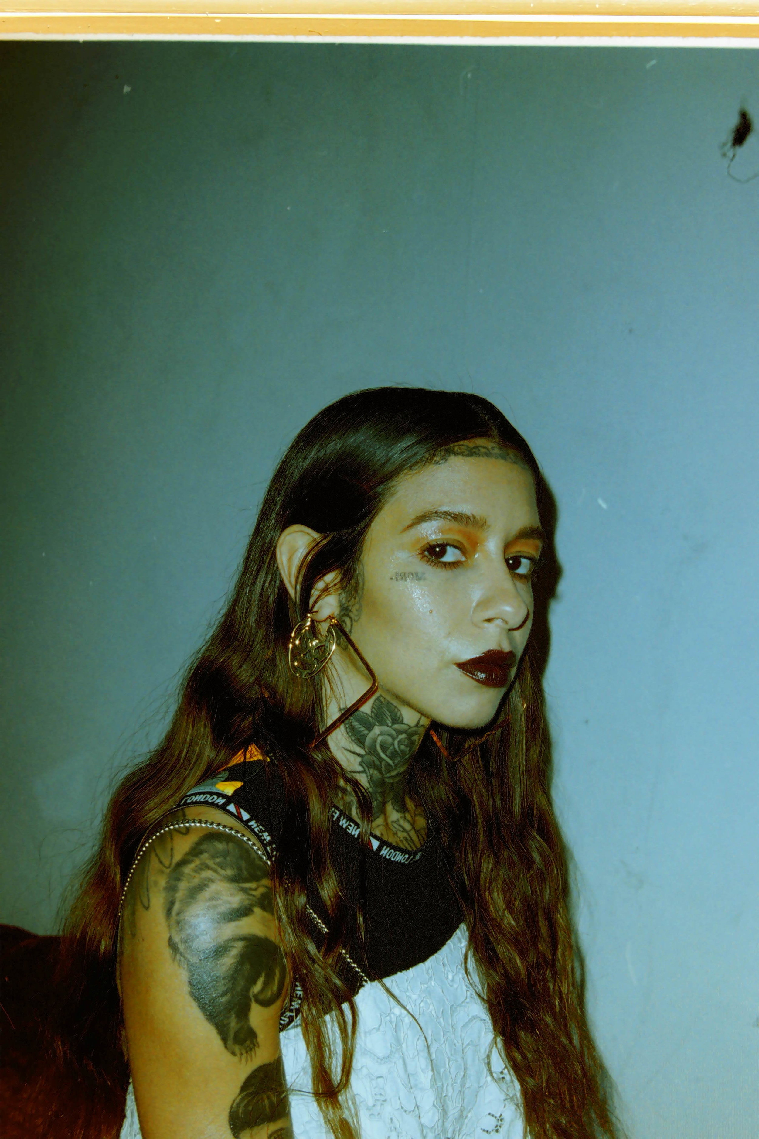 tank + pants Ijiin, camo top NEW FUTURE LONDON, earrings TAWAPA, boots MODEL'S OWN