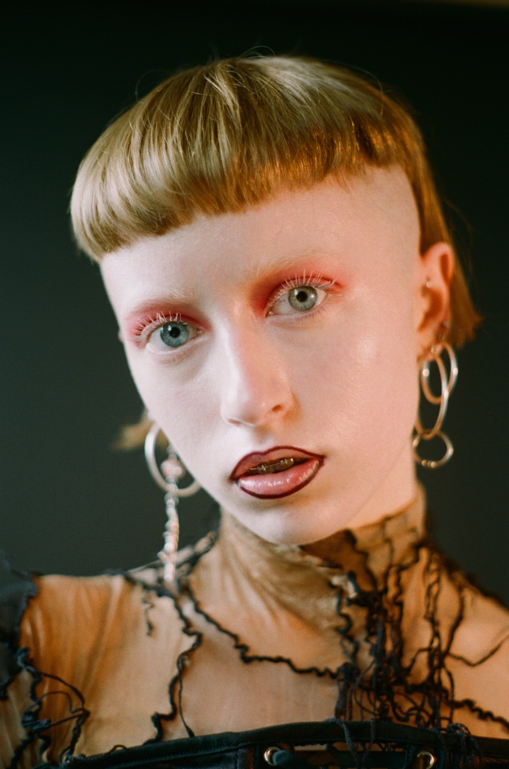 top + trousers Sonia Trefilova, corset STYLIST'S OWN, earrings MODELS OWN