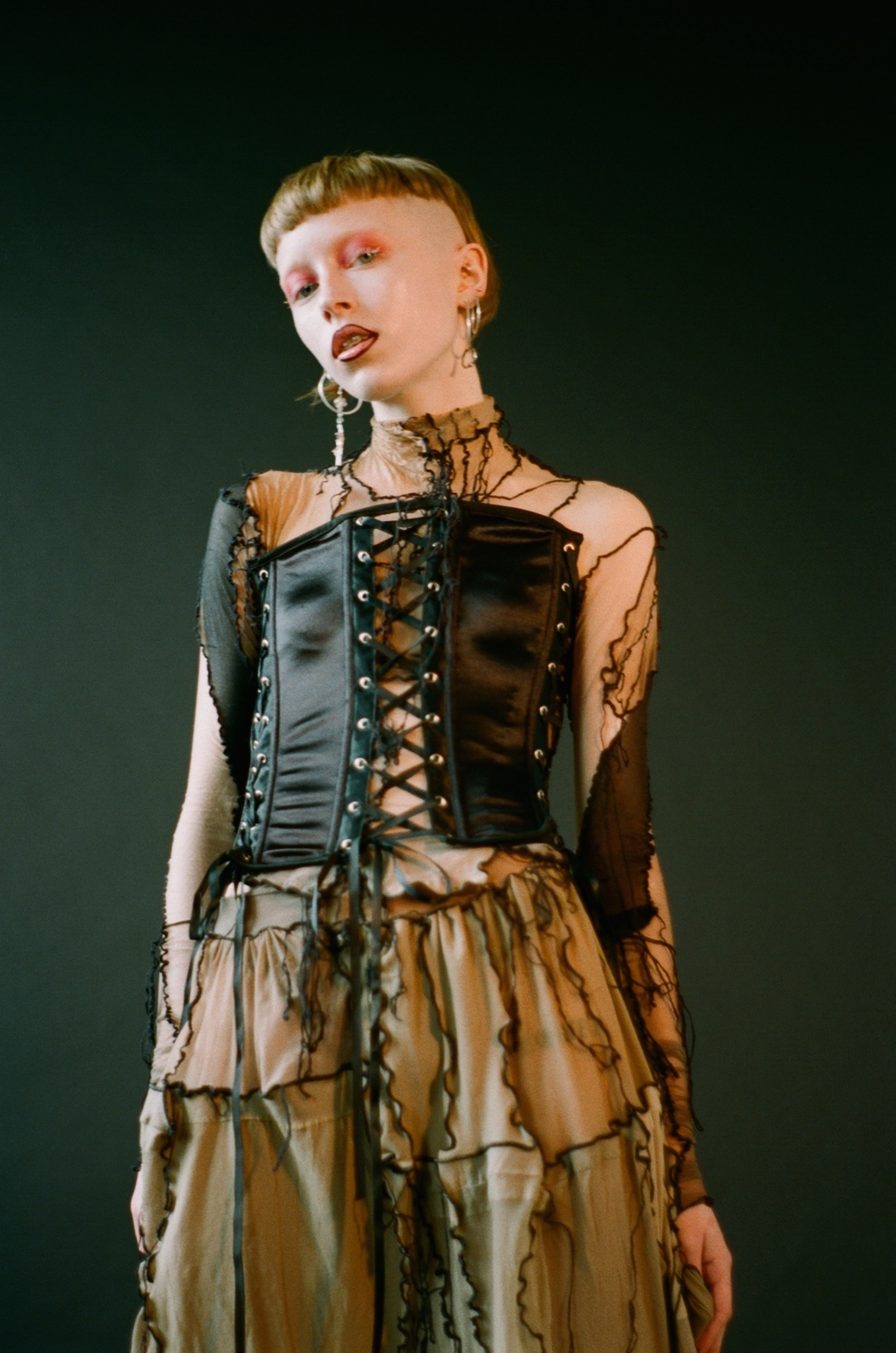 top + trousers Sonia Trefilova, corset STYLIST'S OWN, earrings MODELS OWN