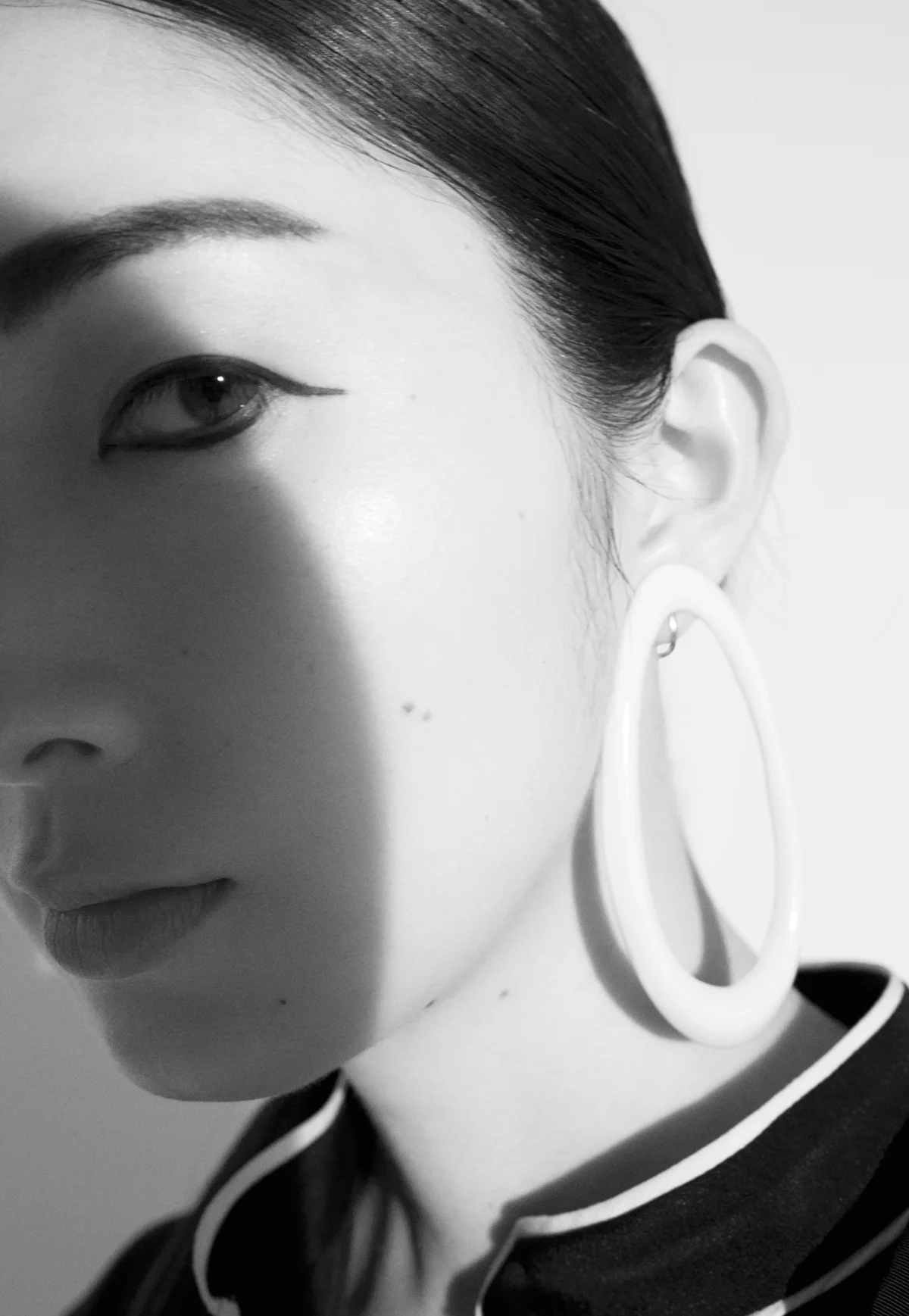 dress TOMORROWLAND, earring STYLIST'S OWN