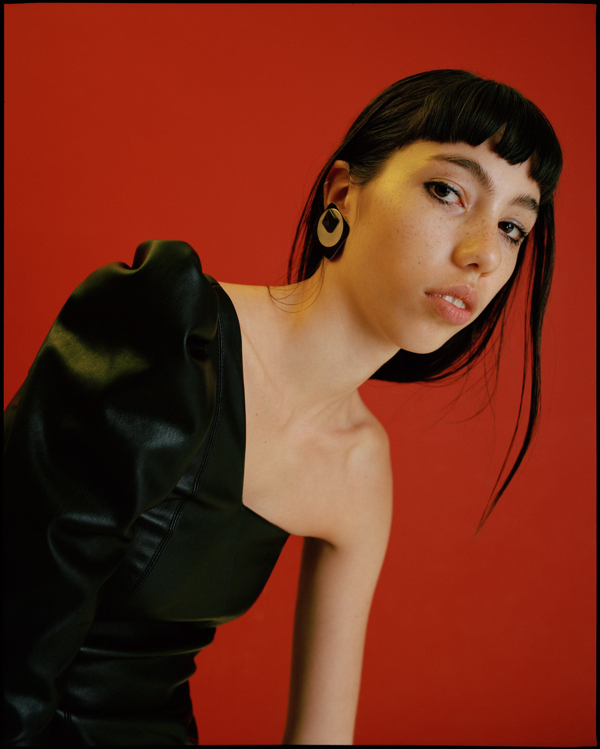 dress SAINT LAURENT, earrings PACO RABBANE