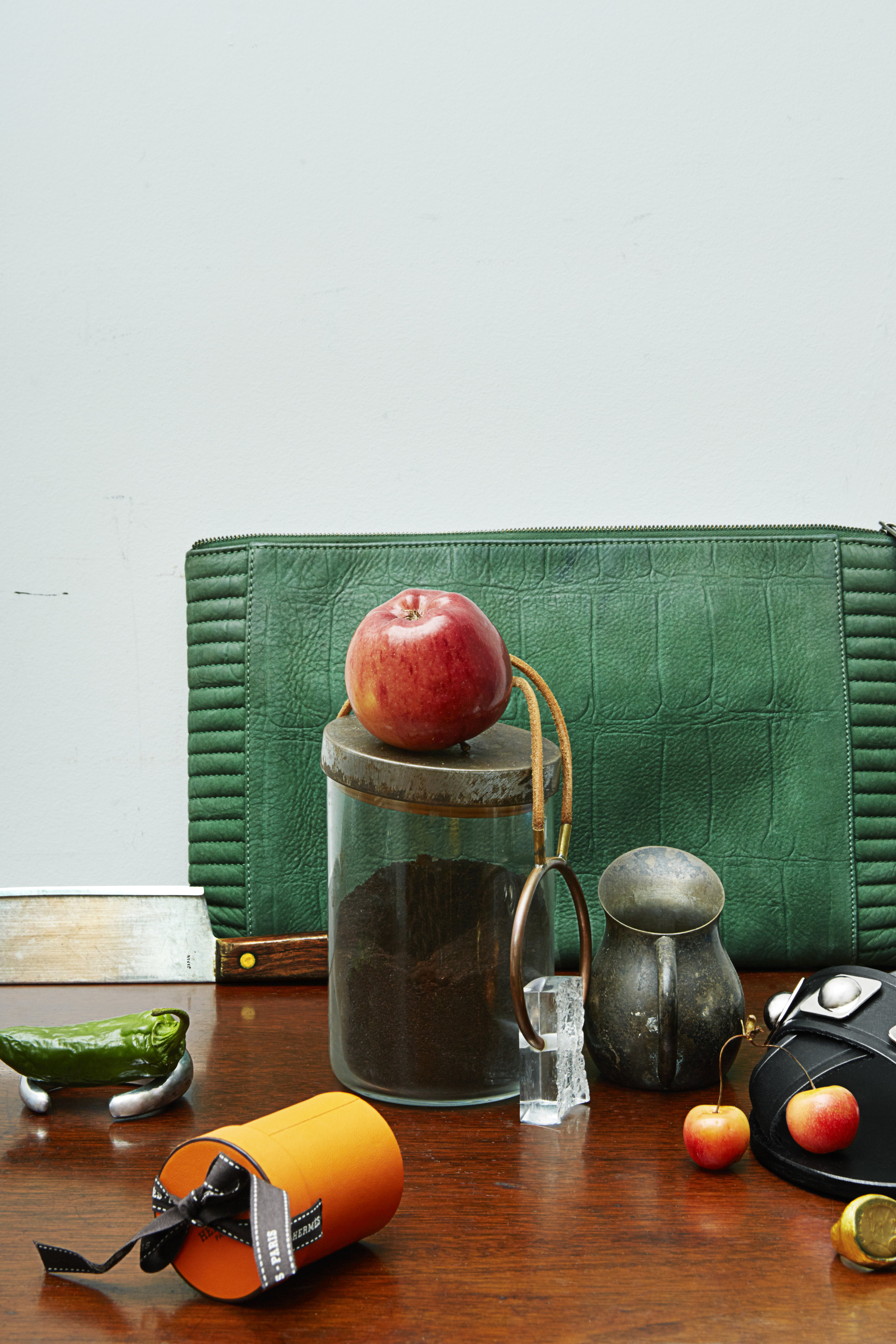 Green Bag Reece Hudson from THE REFORMATION , Box: Hermes, necklace STYLIST'S OWN, Bracelet Charlotte Cauwe from THE REFORMATION , Shoe by Ancient Greek Sandals from NET A PORTER , ring STYLIST'S OWN
