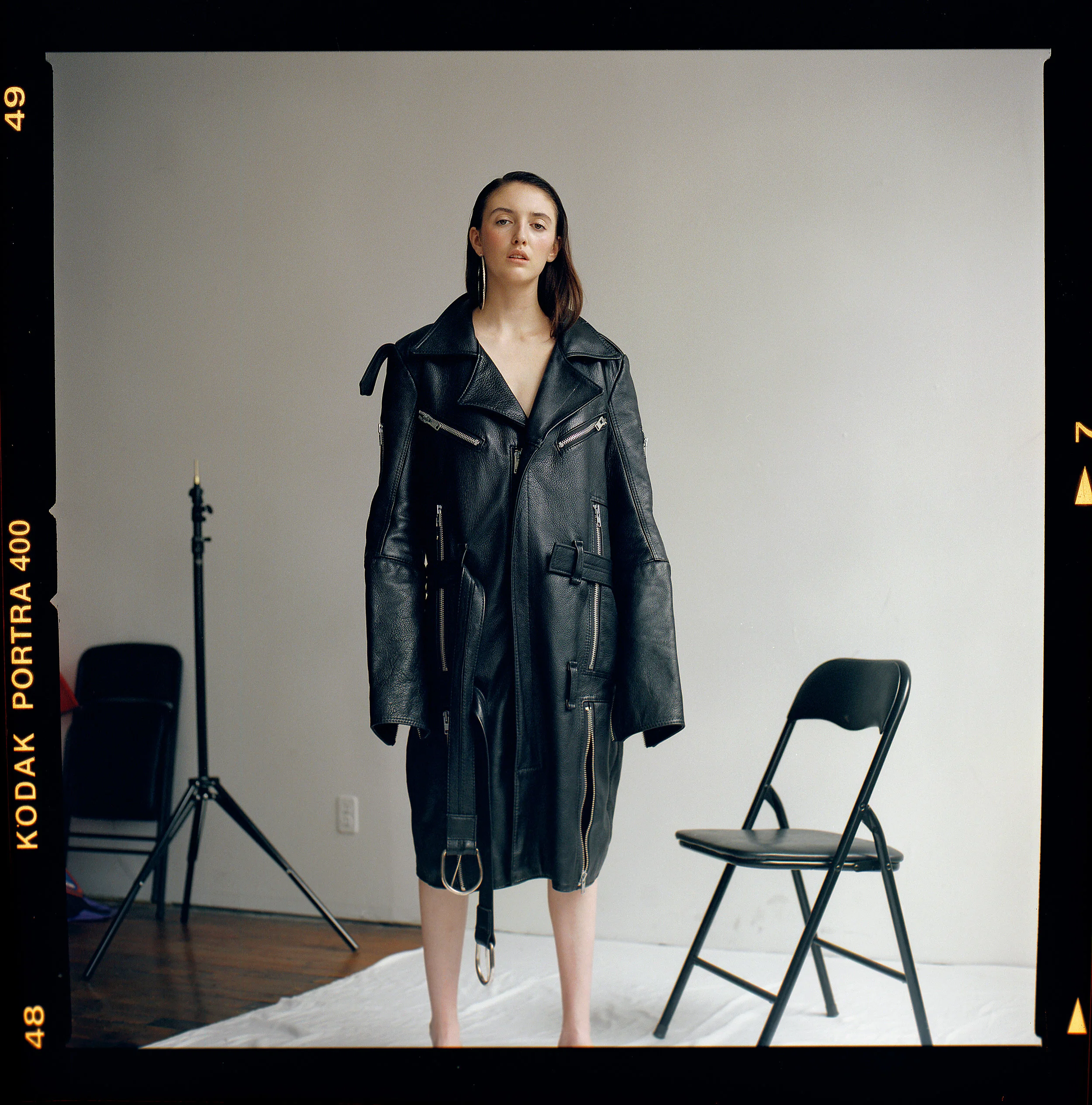  jacket LUOMO STRANO, earrings JENNIFER FISHER,
