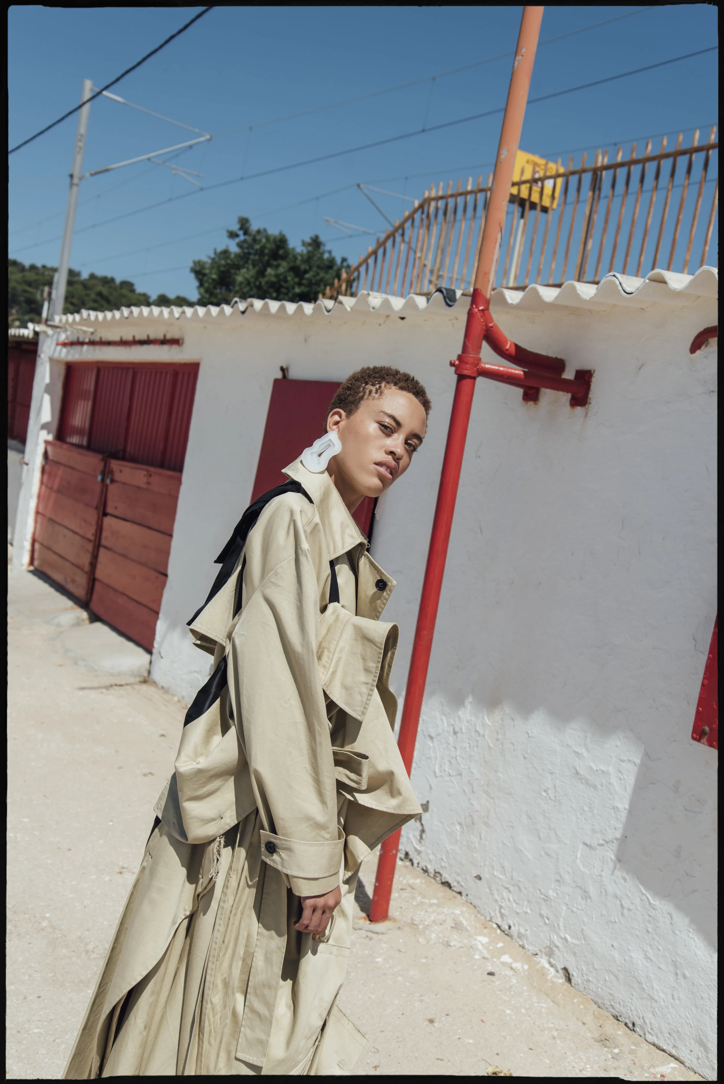 Trench + Coat: Alexandra Moura Earrings: Liliana Afonso Sandals: Zara