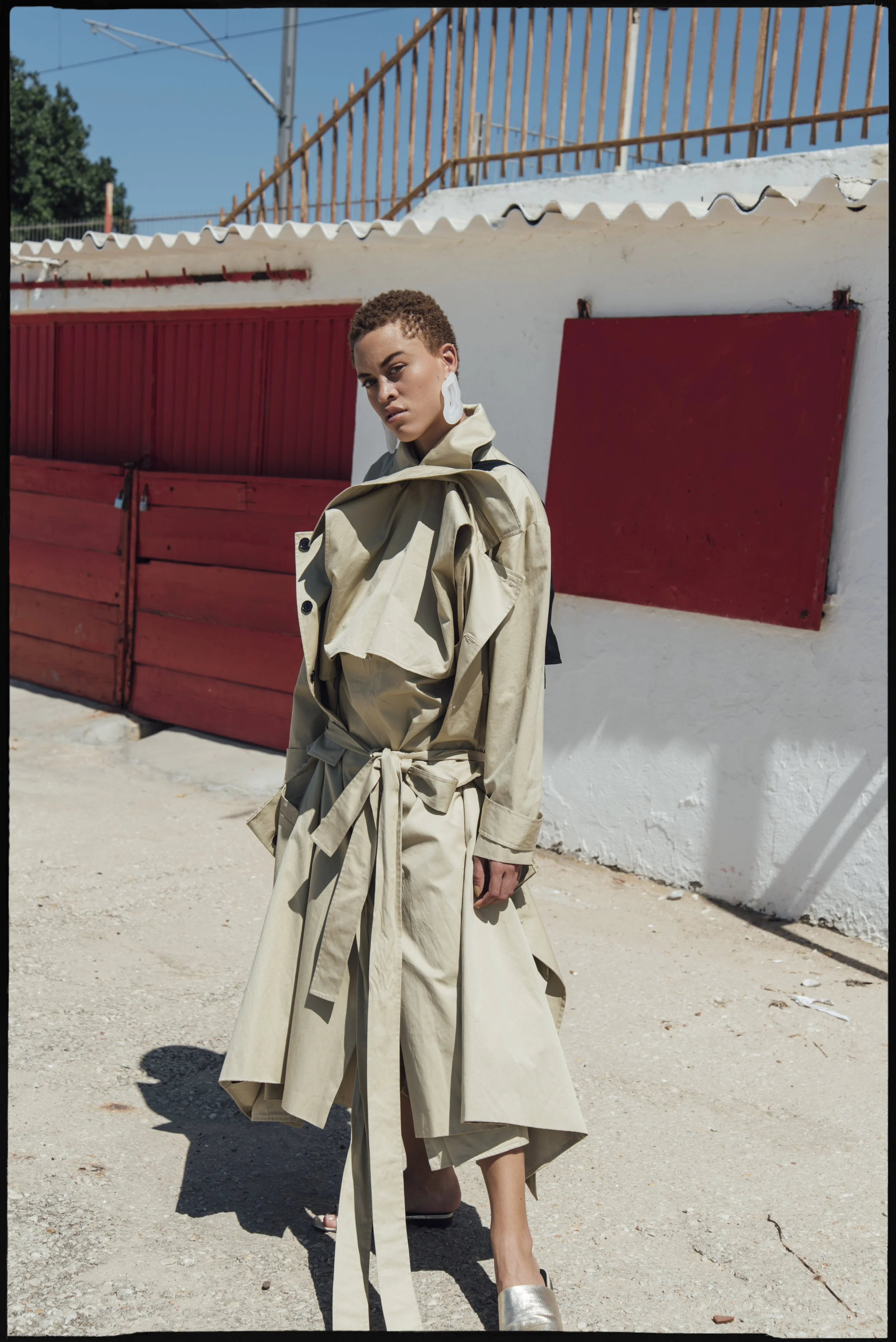Trench + Coat: Alexandra Moura Earrings: Liliana Afonso Sandals: Zara
