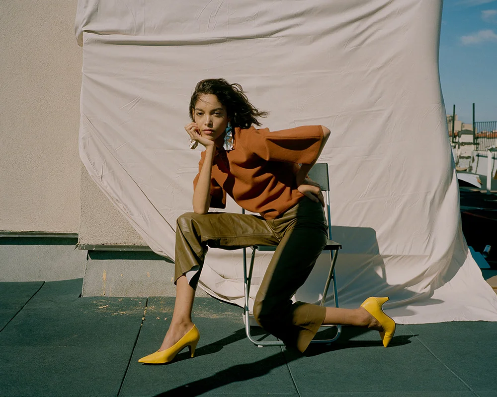 Top by Tibi, Pants by Apiece Apart, Earrings by Closer by WWake, Shoes by Topshop