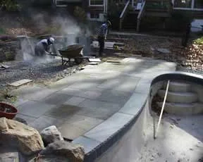  New stone deck added to poolside.