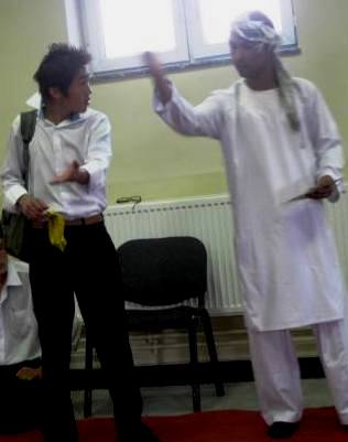Nazar, playing the shopkeeper, sends Ahmed on his way.