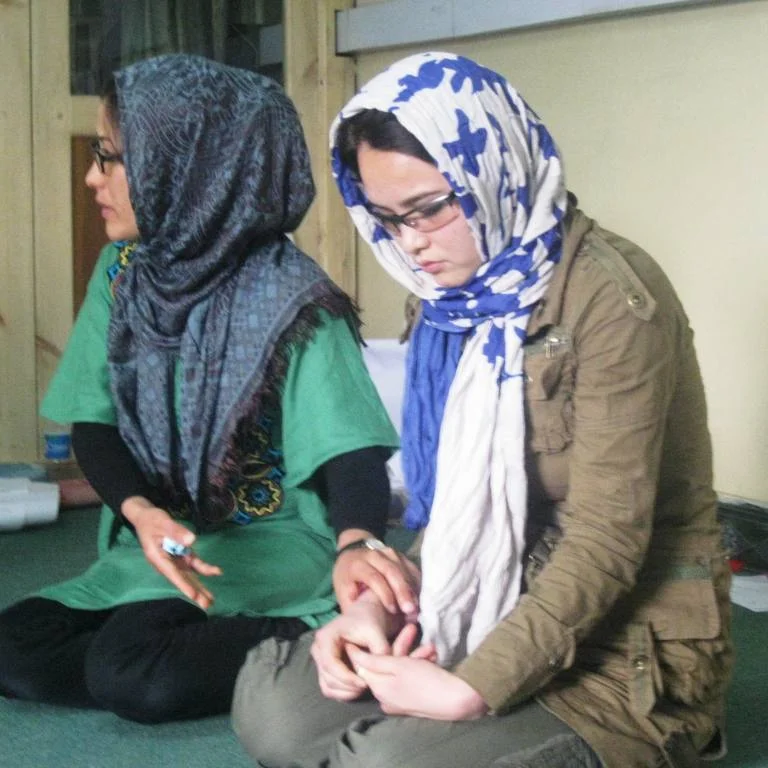 Faribah sulks while her mother tries to push for her education.
