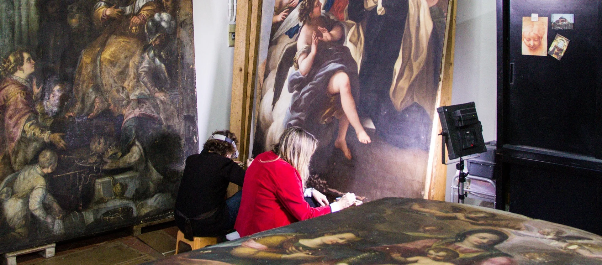 Conservators restoring masterwork by Violante Siries Cerroti