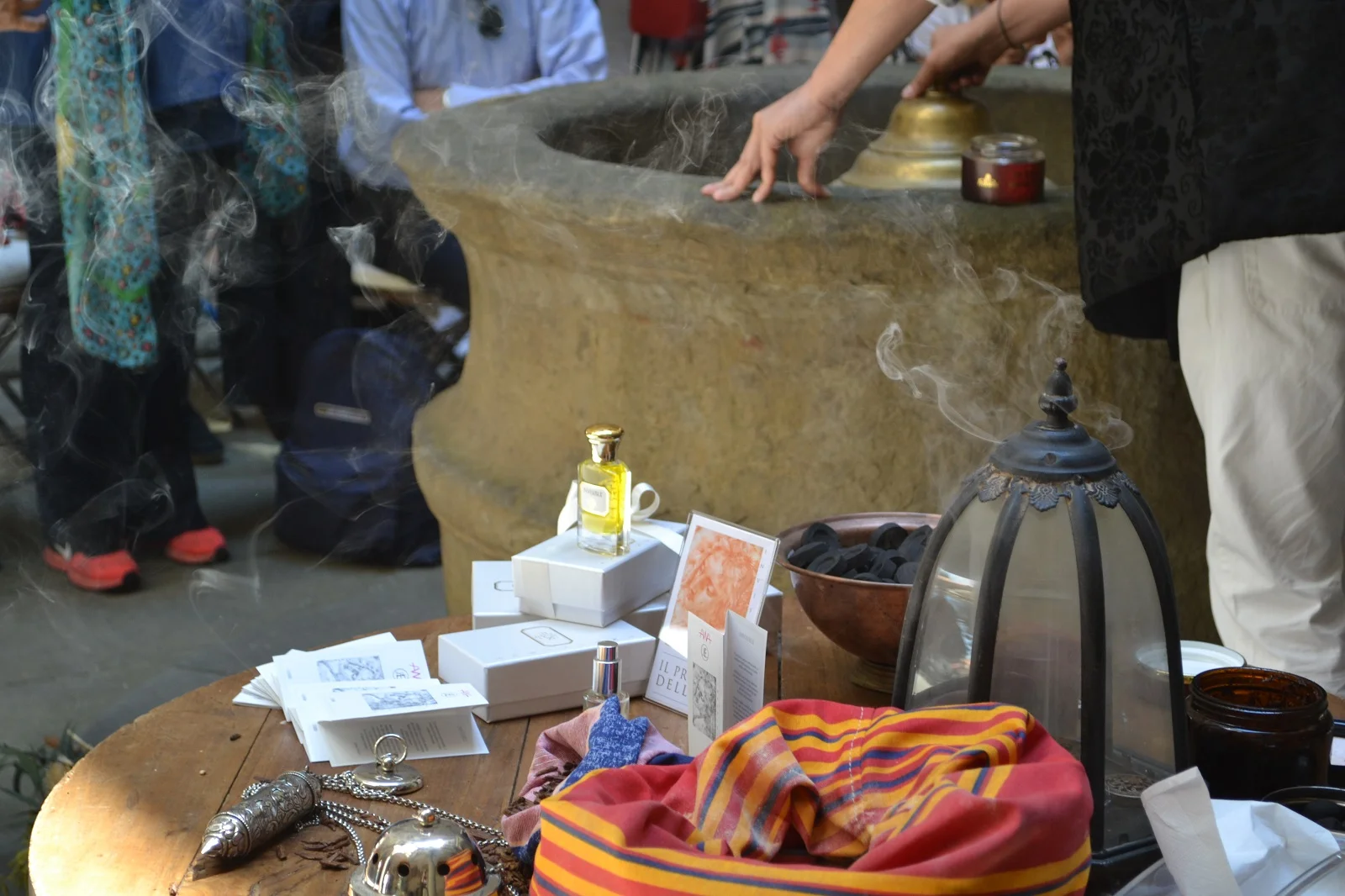 Aquaflor's Sileno Cheloni performs essence-burning ceremony for Invisible.