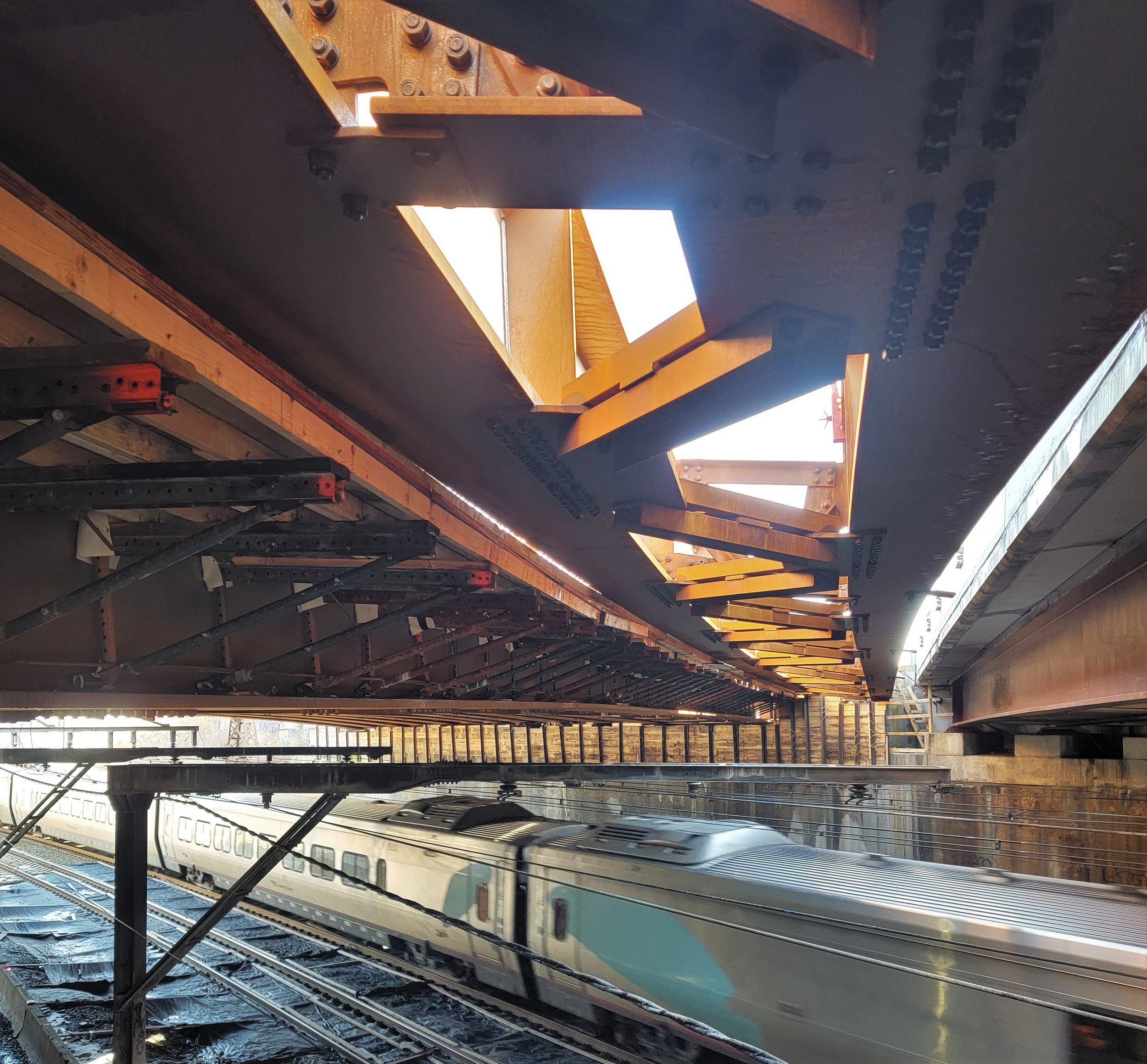TIGHT CLEARANCE BETWEEN NEWLY ERECTED BRIDGE AND AMTRAK CLEARANCE