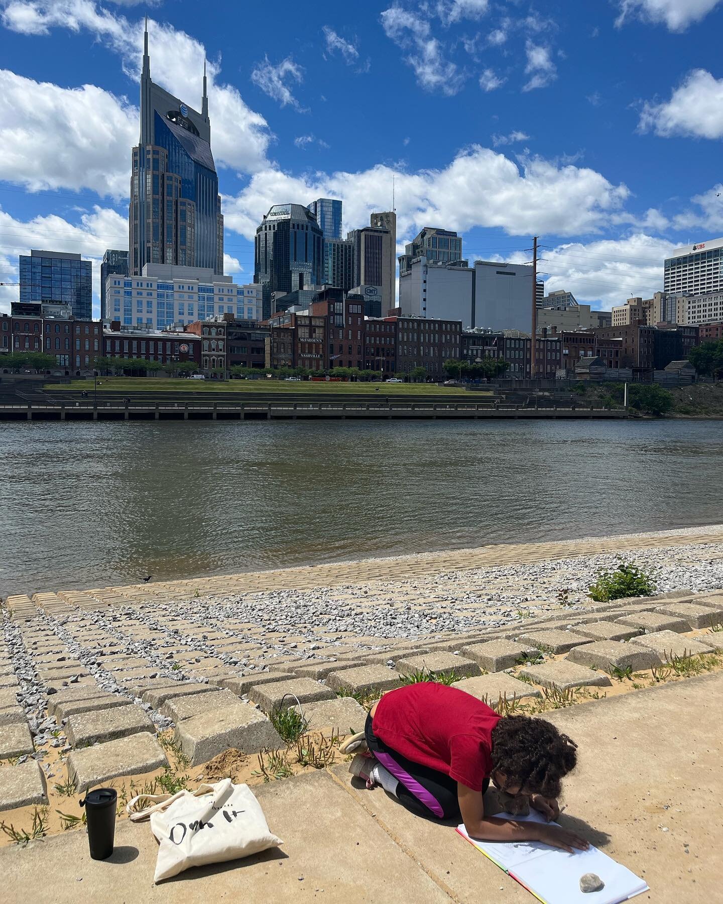 Took a little field trip down to the Cumberland river today.  I had an agenda for our discussion &amp; Lilly brought a sketch pad to draw&hellip; I snapped a pic of her sketching out the scenery around her.  Was a sweet homeschool day. 💕