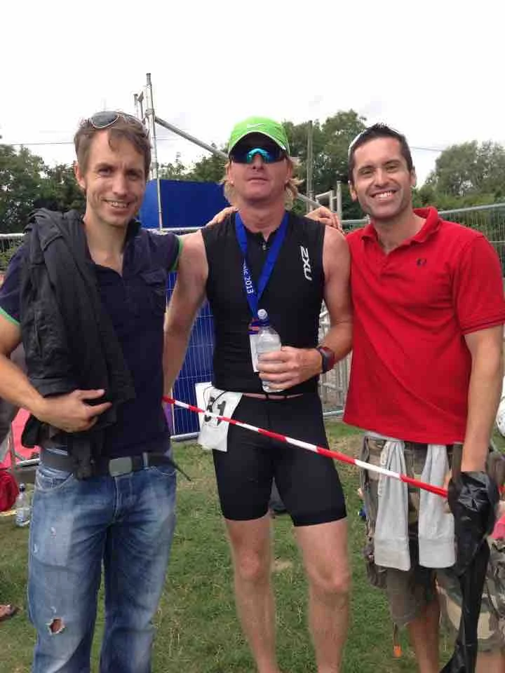 Simon and Paul watching Spencer complete Half Ironman