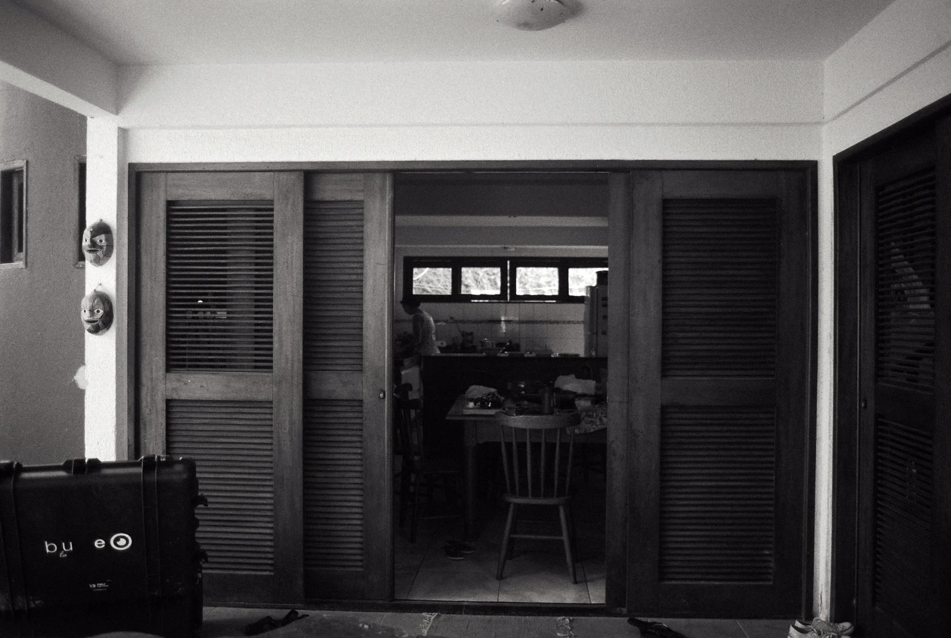 The flight case belonging to Christine's underwater robot sits by the door to the house in Olinda, where we met and changed places with the eXXpedition Ascension crew and Katie is busy in the kitchen, probably chopping up mangoes....