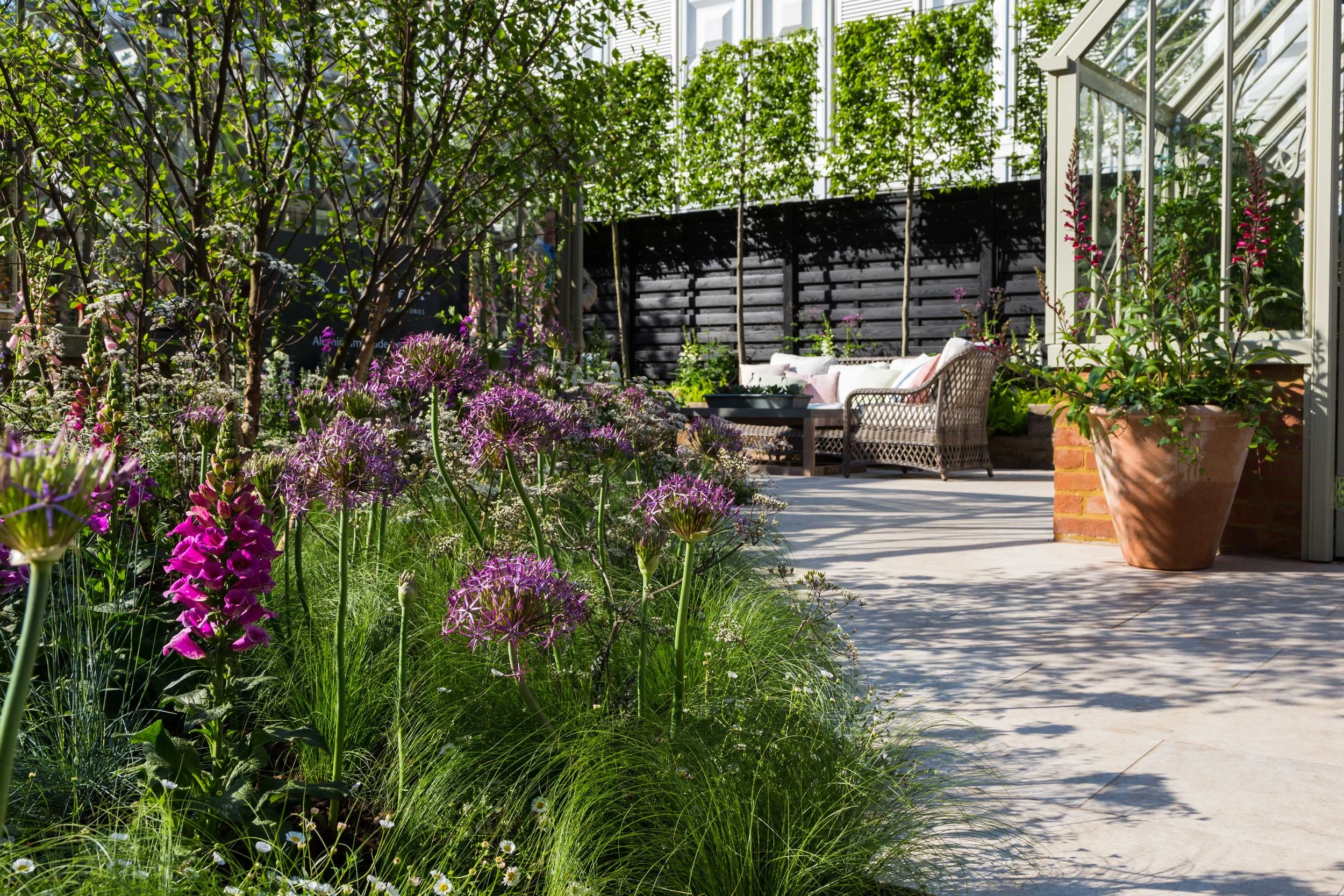 Ashbourne Beige Porcelain Paving by Westminster Stone. Designer: Jake Curley. Image: Chris Denning/ Verve Garden Design.