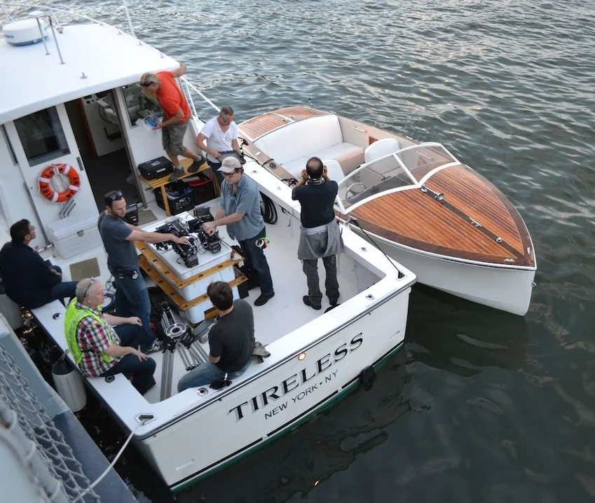 Prepping commercial: chase boat and picture boat on Brooklyn waterfront.