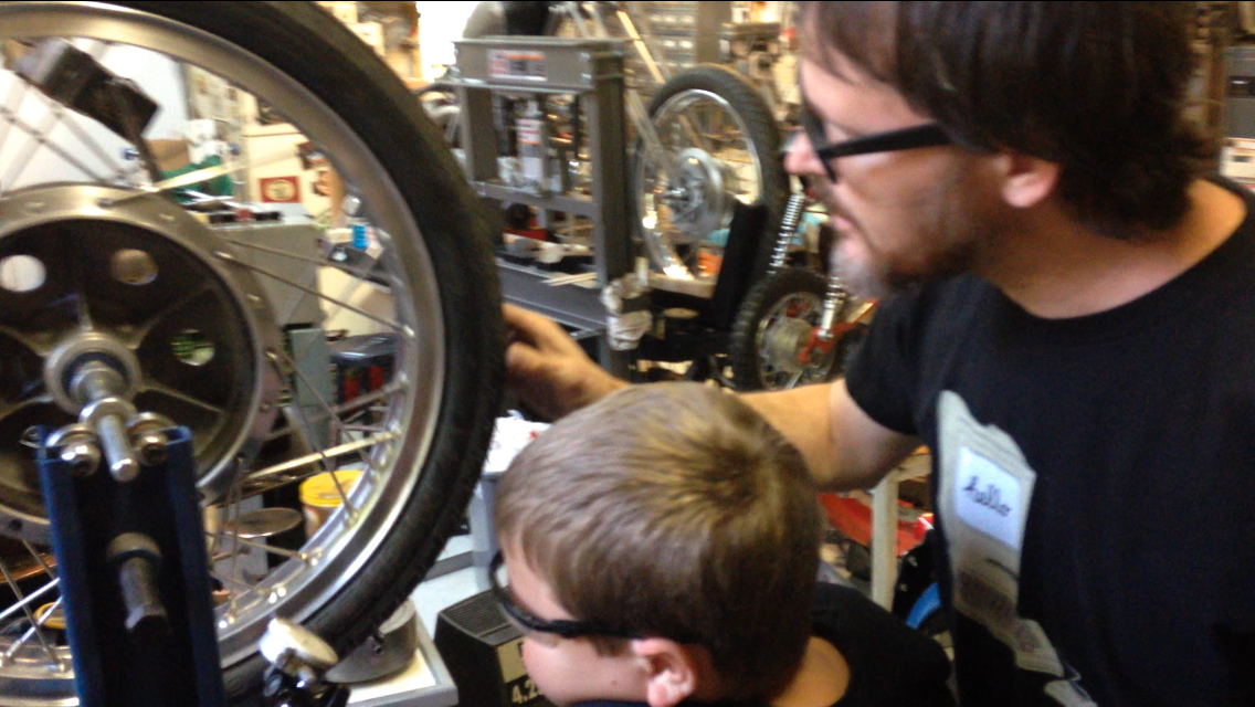 Zeke and Ben Truing a Wheel