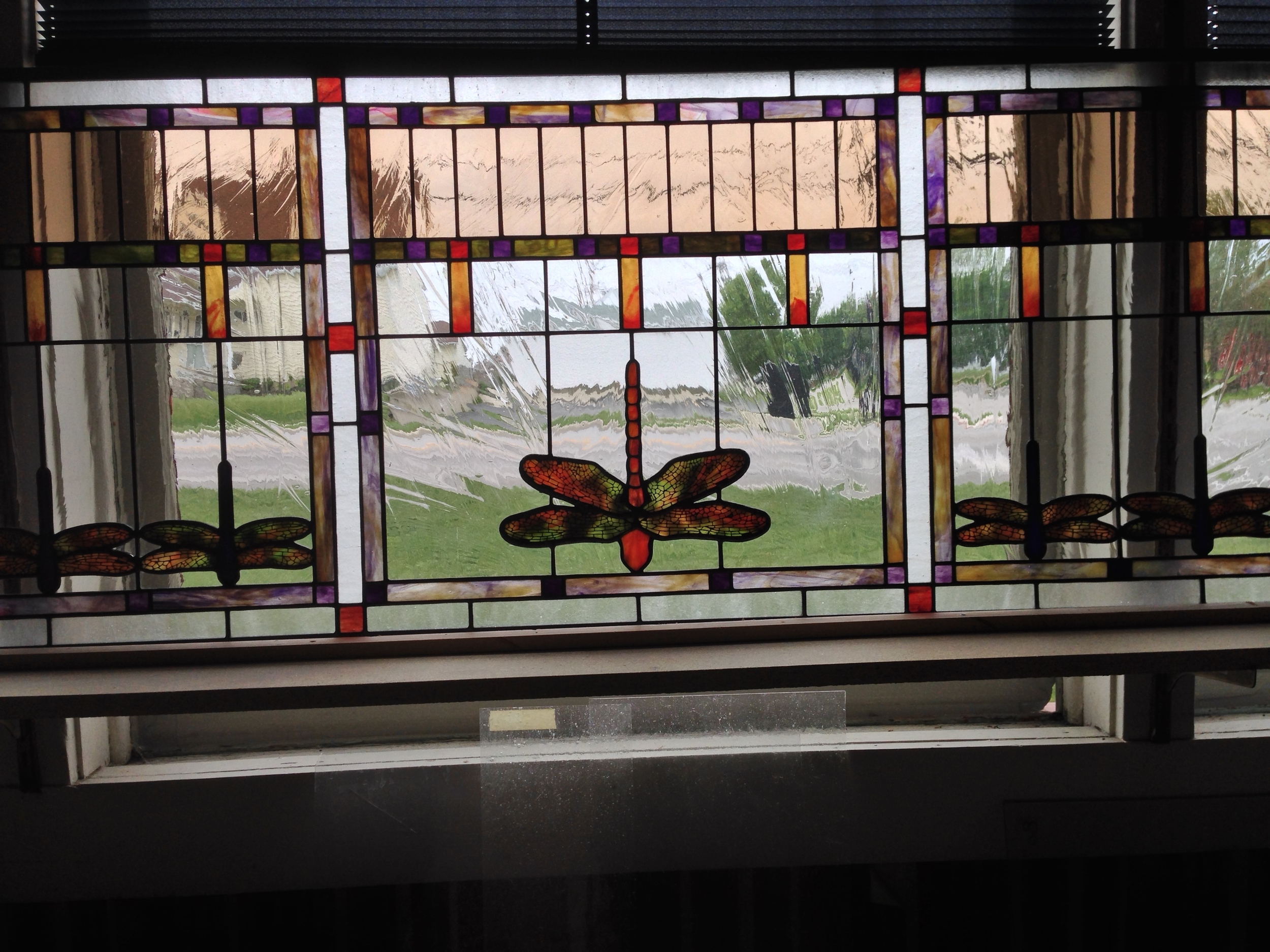 Dragonfly windows installed in entryway