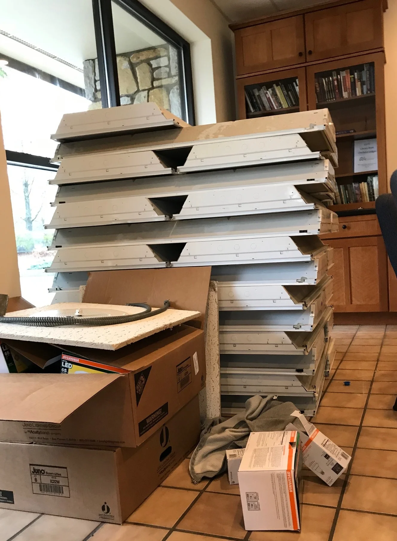 As usual, our electrician, Jeremy, was very tidy as he created the tower of old fixtures to be recycled. These would be considered scrap metal.
