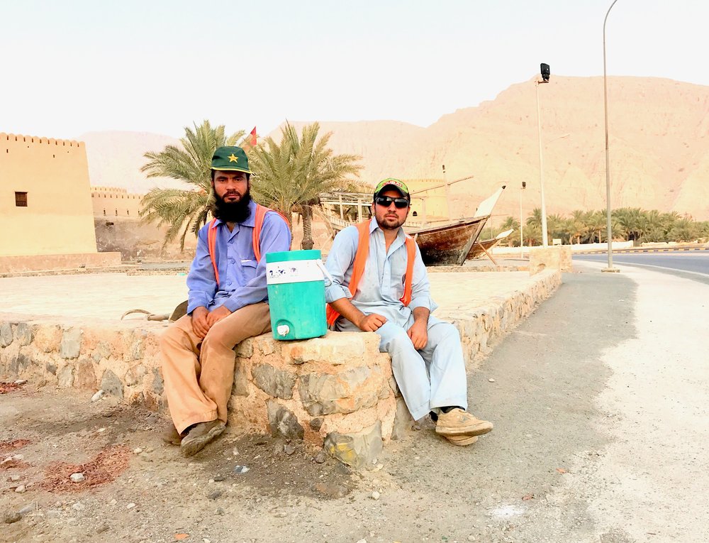 Workers taking a break in Khasab, Oman.