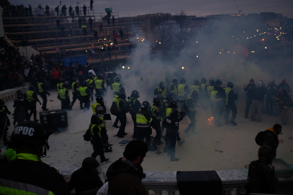 Virginia State Police using tear gas to clear the West Portico of the U.S. Capitol, January 6th, 2021.