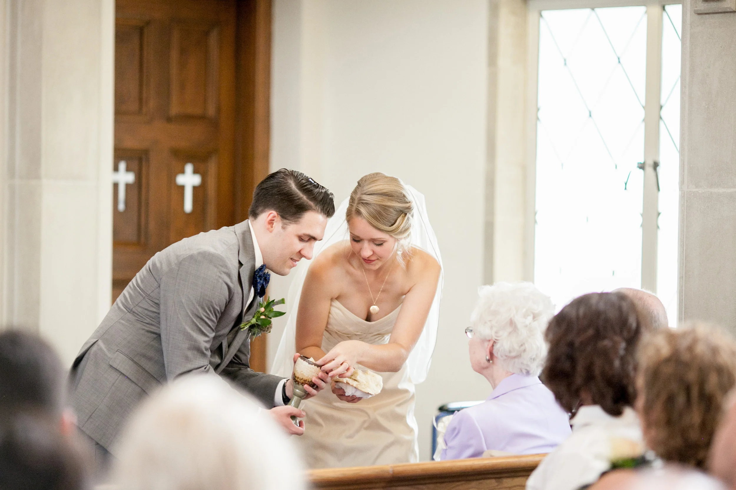 Elena and Zach's wedding ceremony was emotional and perfectly them. Zach's youth pastor was the officiant. Their servant's hearts shined as the bride and groom served communion to each of the their wedding guests. 