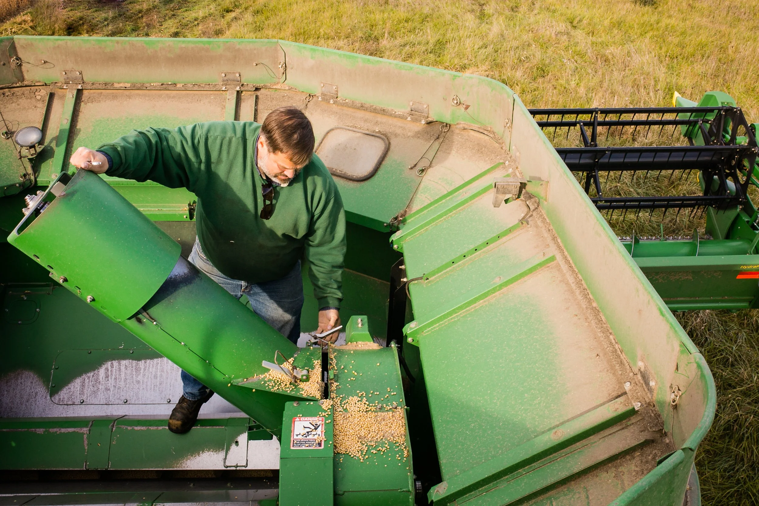 Todd Hesterman: “working on combine” I chose this photo to demonstrate my effort to find a unique angle while Todd made a repair to the combine. Communication was a key factor to capturing this image knowing where I was allowed to position myself and