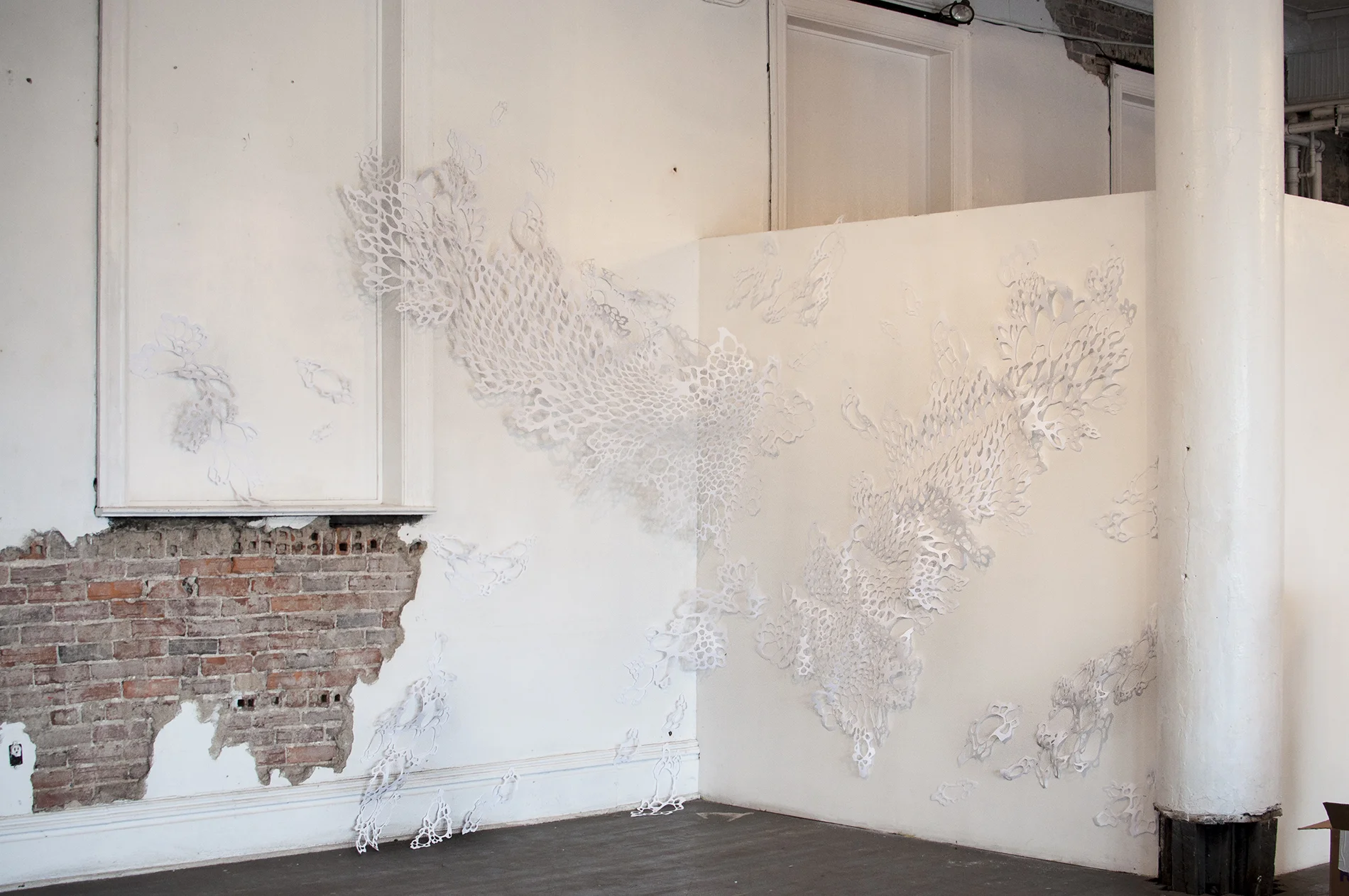 Untitled Installation Handcut Paper Pictured here installed at Unsmoke Art Systems in Braddock, PA. 2016.