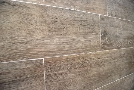  Wood replica tiles in master bath offer texture and durability of design 