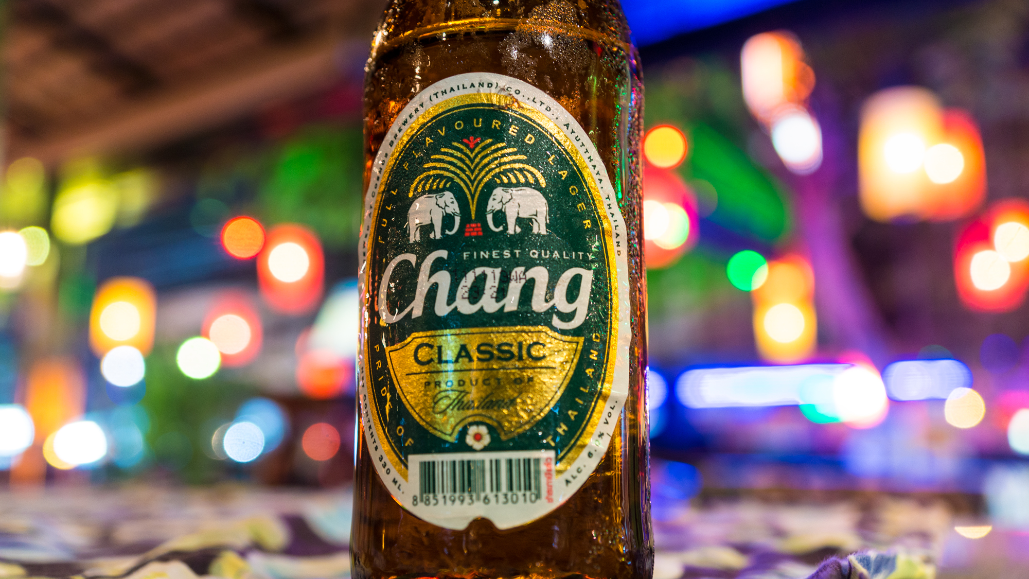 Chang beer costs about 20(thai bhat roughly .61 cent) It'll get you drunk and quickly spending your money on more expensive things.