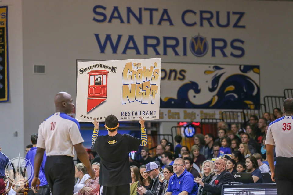 Time out for the Half Court shot, sponsored by The Crow's Nest at the Santa Cruz Warriors game on January 2, 2015 at Kaiser Permanente Arena in Santa Cruz, California. (Photo: Tim Cattera Photography/SC Warriors 2015)