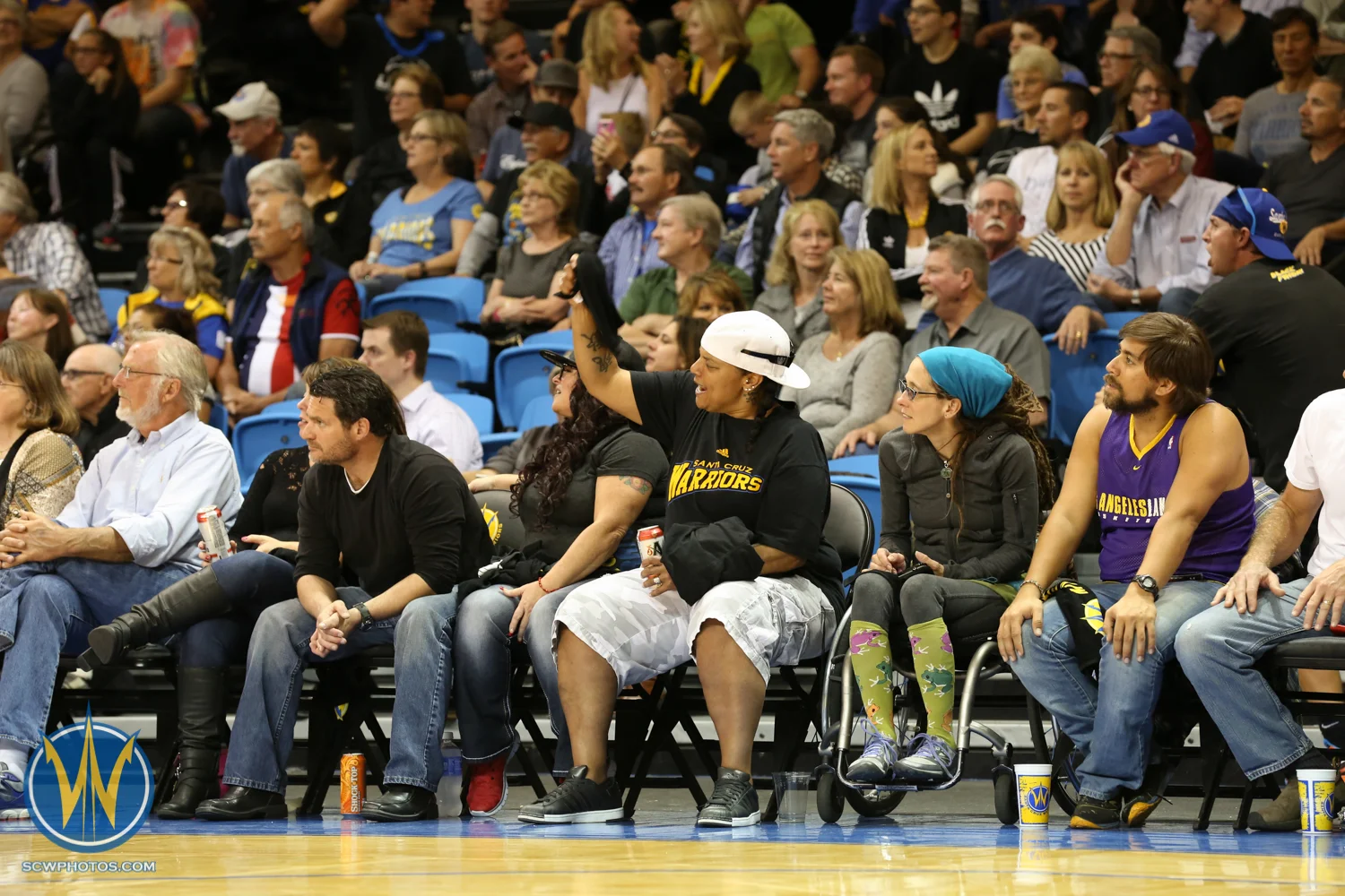 A fan waves her rally towel at the Santa Cruz Warriors game on March 20, 2015 at Kaiser Permanente Arena in Santa Cruz, California. (Photo: Tim Cattera Photography/SC Warriors 2015)