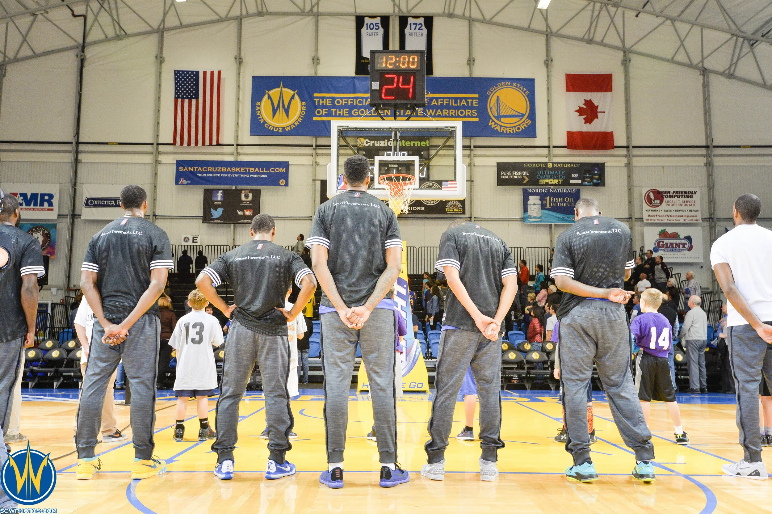 The Warriros bow there heads during the National Anthem at the Santa Cruz Warriors game on 12/22/15 at Kaiser Permanente Arena in Santa Cruz, California. (Photo: (Pasag Photography)/ SC Warriors 2015) 