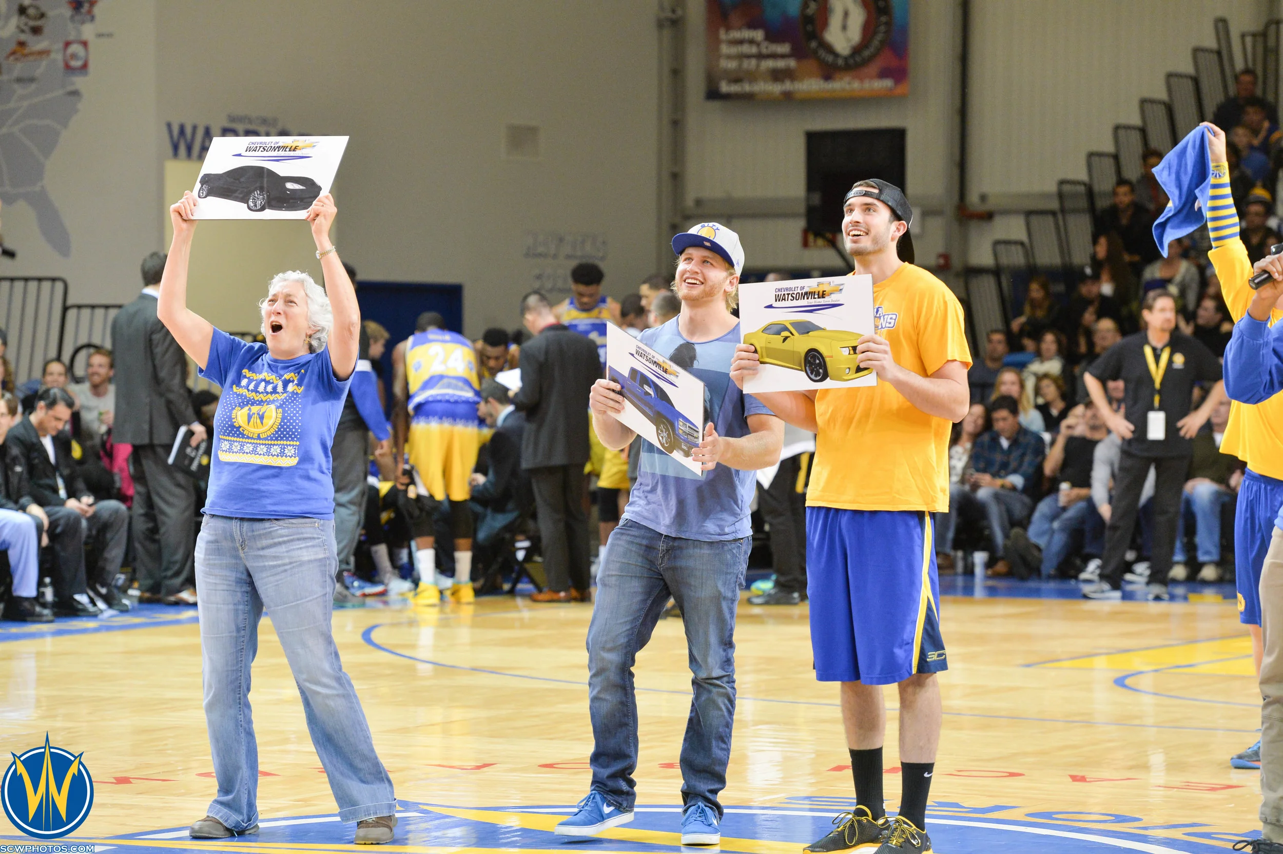 Warrior fans participate during a promotional game during a timeout at the Santa Cruz Warriors game on 12/22/15 at Kaiser Permanente Arena in Santa Cruz, California. (Photo: (Pasag Photography)/ SC Warriors 2015) 
